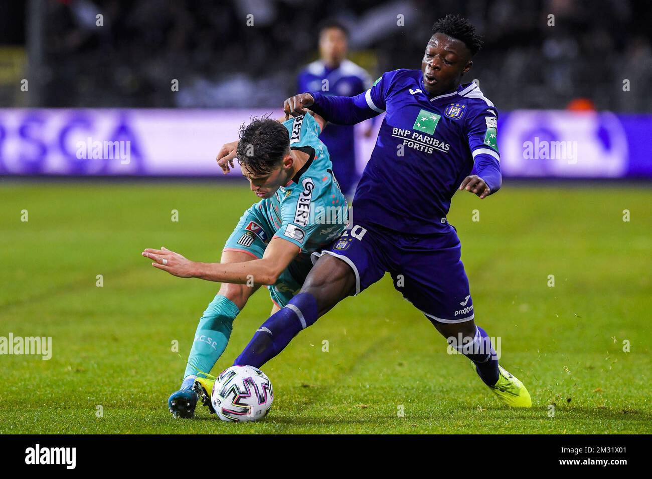 BRUSSELS, BELGIUM - December 08: Jeremy Doku of Anderlecht and Maxime Busi  of Charleroi fight for the ball during the Jupiler Pro League match day 18  between Rsc Anderlecht vs Sporting Charleroi