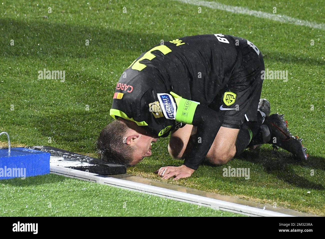 Genk's Joakim Maehle Pedersen lies injured on the ground during a friendly soccer match between KRC Genk and Hungarian club Ferencvarosi Torna Club, during their winter training camps, Friday 10 January 2020 in La Nucia, Spain. BELGA PHOTO YORICK JANSENS Stock Photo