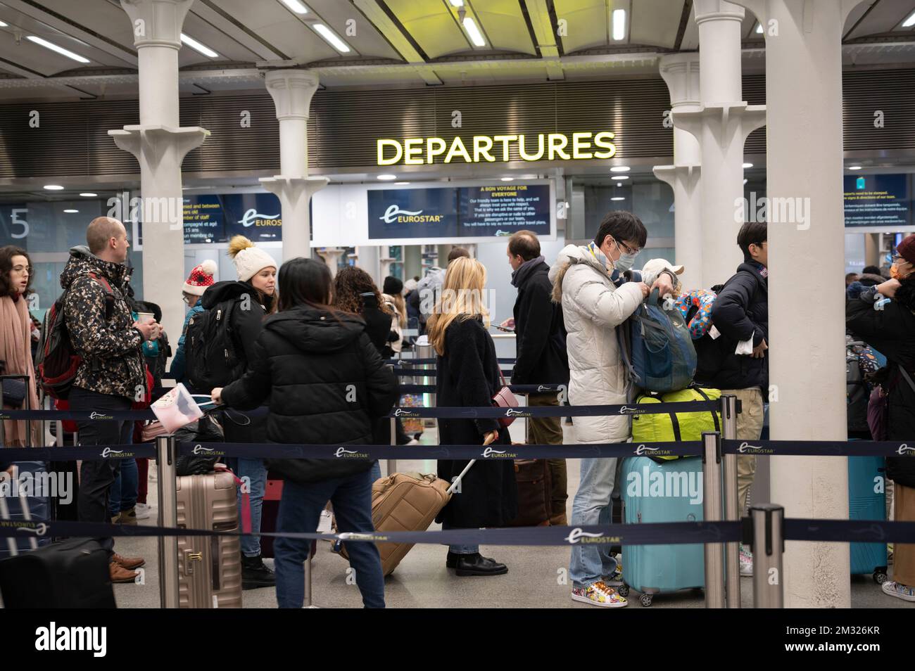 Kings Cross St Pancras, London, England, UK. Passengers queue to board a Eurostar train. Stock Photo