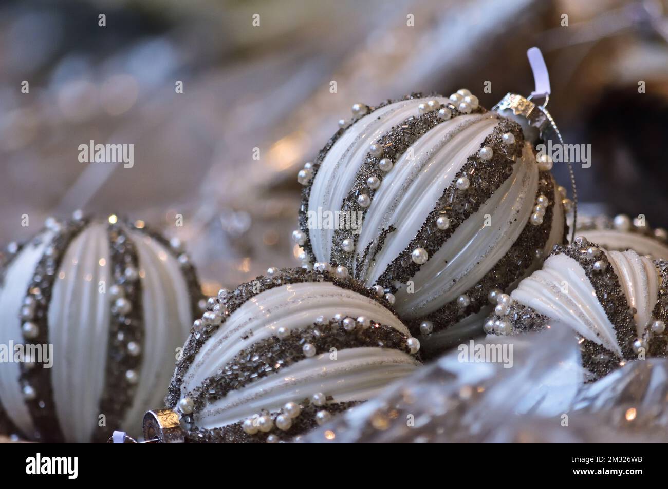 White christmas ornaments on Christkindlmarkt in Vienna for sale Stock Photo