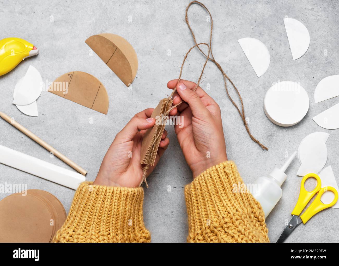 Step 6. Add Twine and Seal Inner Edge. Making of festive Christmas tree ornaments from coffee
