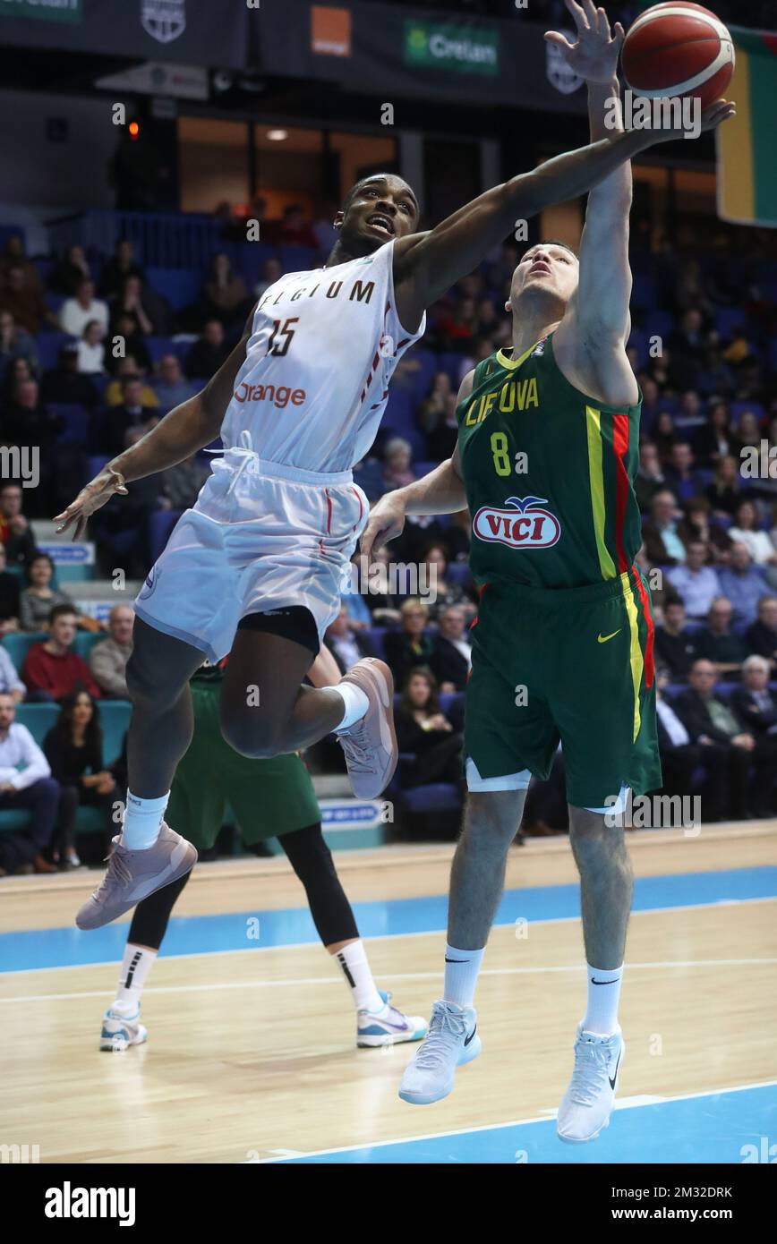 Belgium's Retin Obasohan and Lithuania's Jonas Maciulis fight for the ball during the match between the Belgian Lions and Lithuania, game one of six in group C of the qualifications for the 2021 European Championships, Friday 21 February 2020, at the Mons Arena in Jemappe. BELGA PHOTO VIRGINIE LEFOUR Stock Photo
