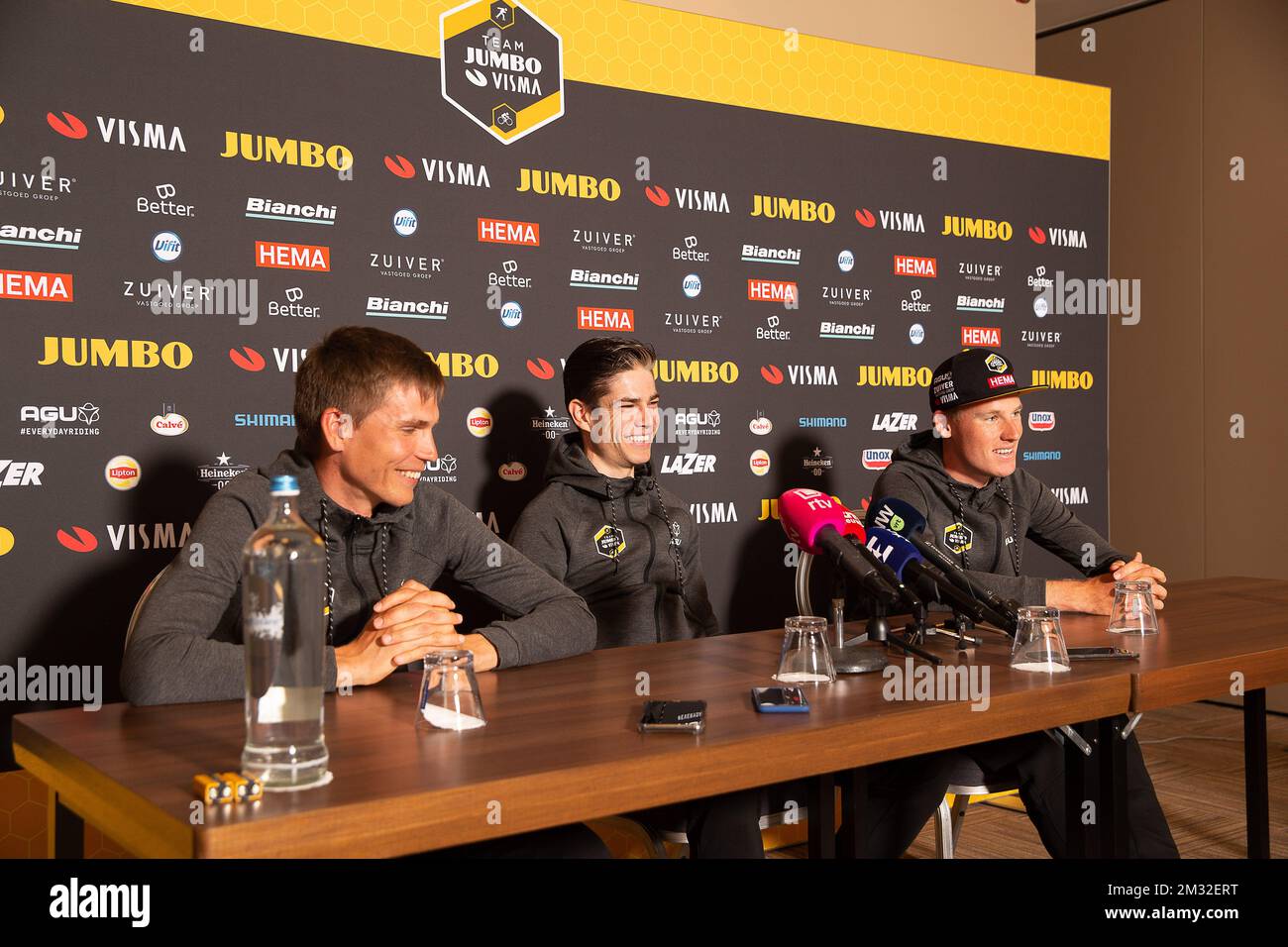 Norwegian Amund Grondahl Jansen, Belgian Wout Van Aert and Dutch Mike Teunissen of Team Jumbo-Visma pictured at press conference of Jumbo-Vista cycling team in Gent, ahead of the 75th edition of the one-day cycling race Omloop Het Nieuwsblad, Friday 28 February 2020. BELGA PHOTO JAMES ARTHUR GEKIERE Stock Photo