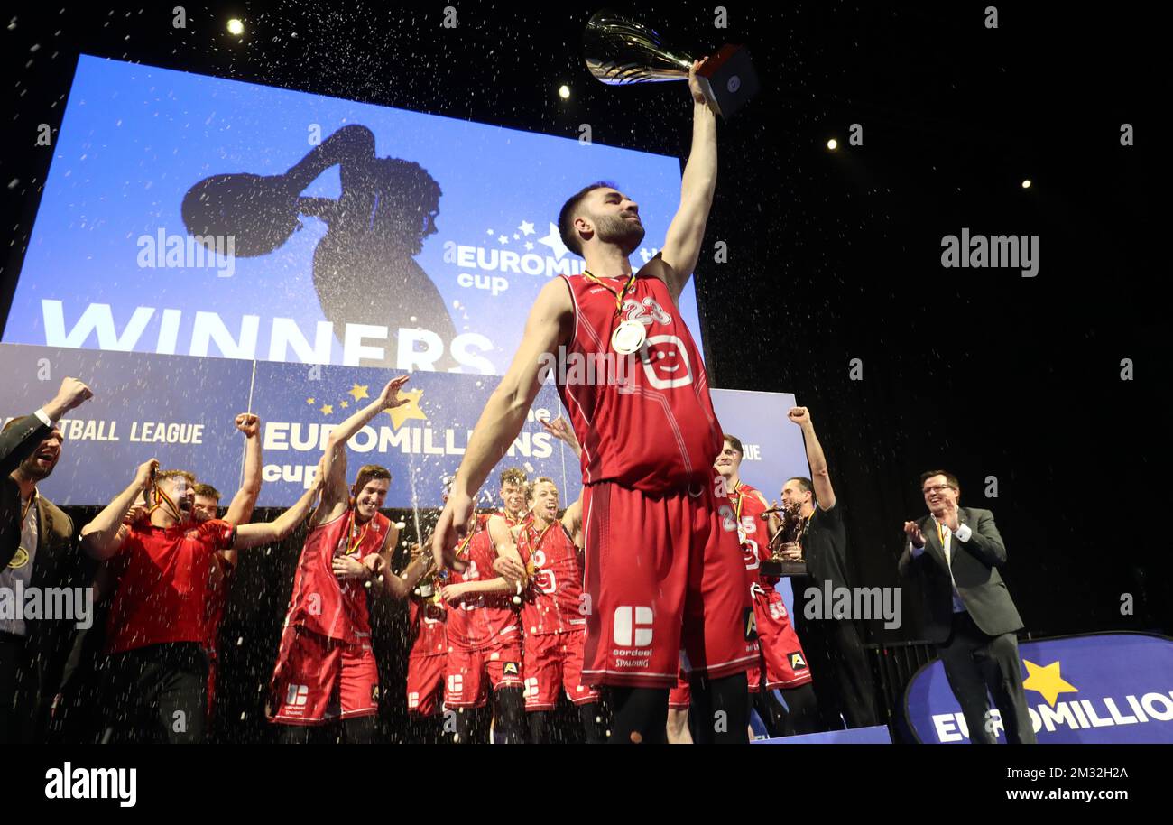 antwerp's players celebrate after winning a basketball match between