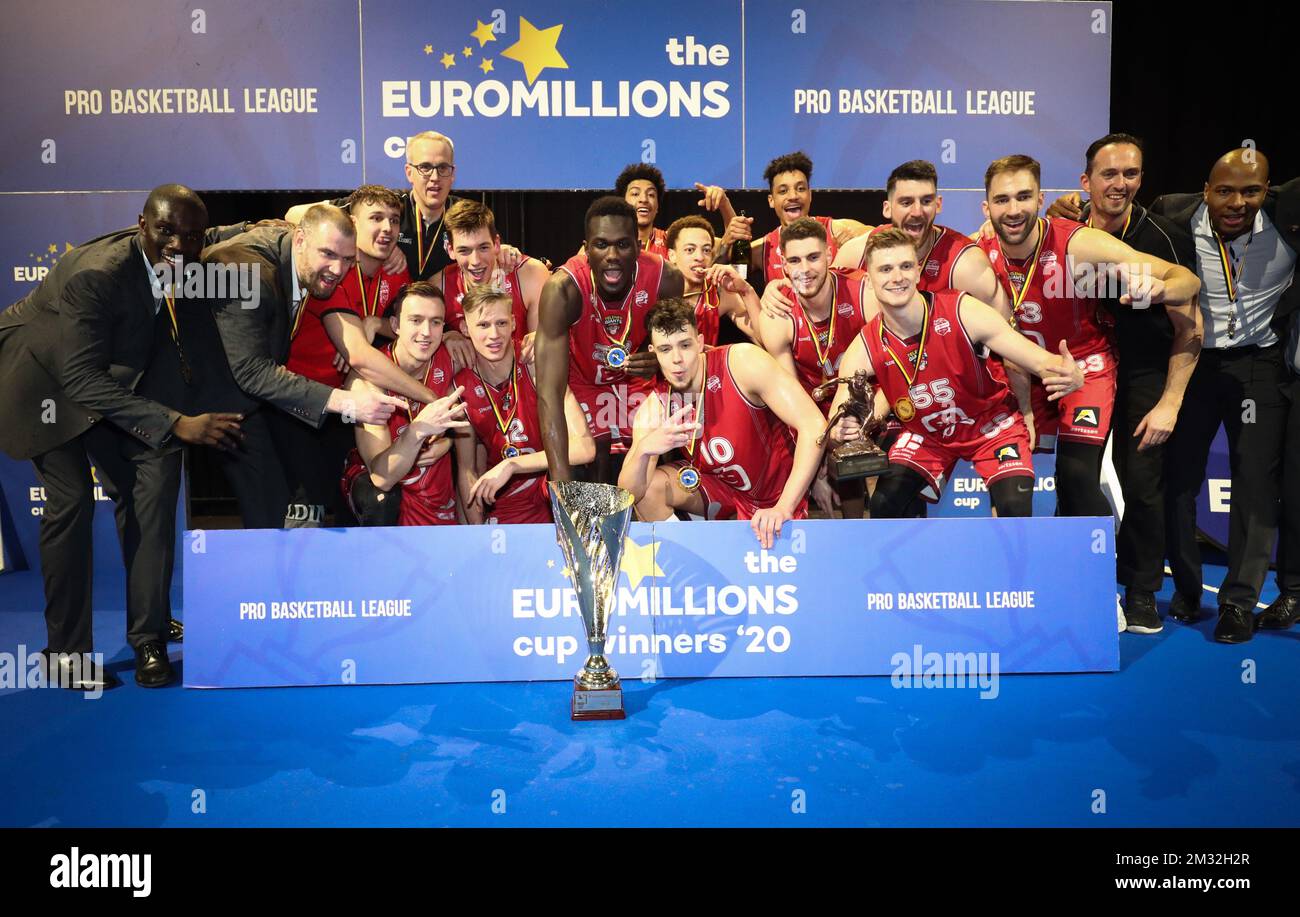 antwerp's players celebrate after winning a basketball match between