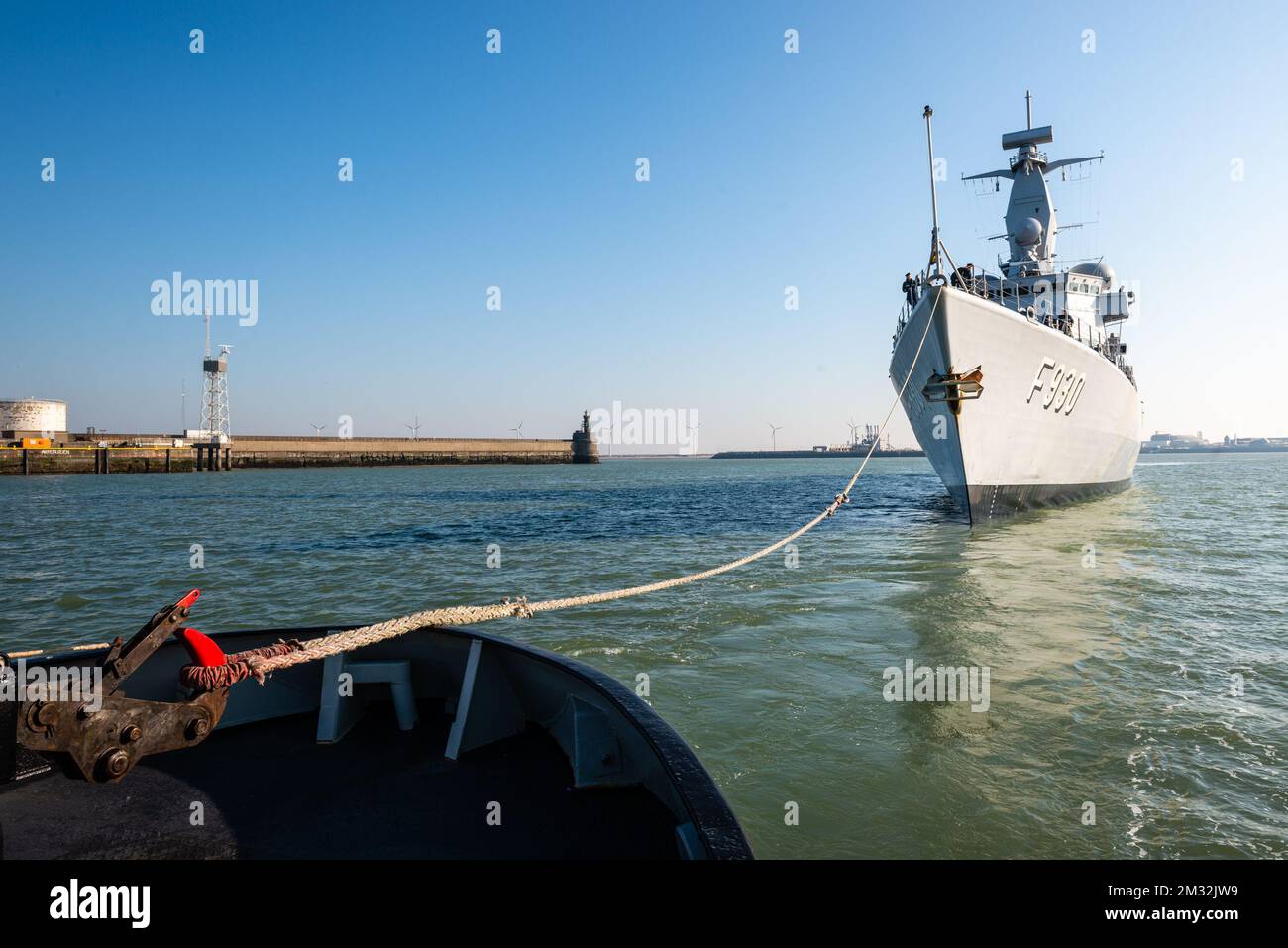 ATTENTION EDITORS - HAND OUT PICTURES - EDITORIAL USE ONLY - MANDATORY CREDIT HANDOUT DEFENSIE - DEFENCE TBN JORN URBAIN Illustration picture shows the arrival of Belgian frigate Leopold 1 in Zeebrugge, Friday 27 March 2020. One of the sailors on the frigate has a confirmed Corona virus infection and has left the ship earlier. Due to the strict measures following such an infection, the ship has returned earlier from its mission and all non-infected sailors must now stay in home quarantine. BELGA PHOTO HANDOUT DEFENSIE - DEFENCE TBN JORN URBAIN  Stock Photo