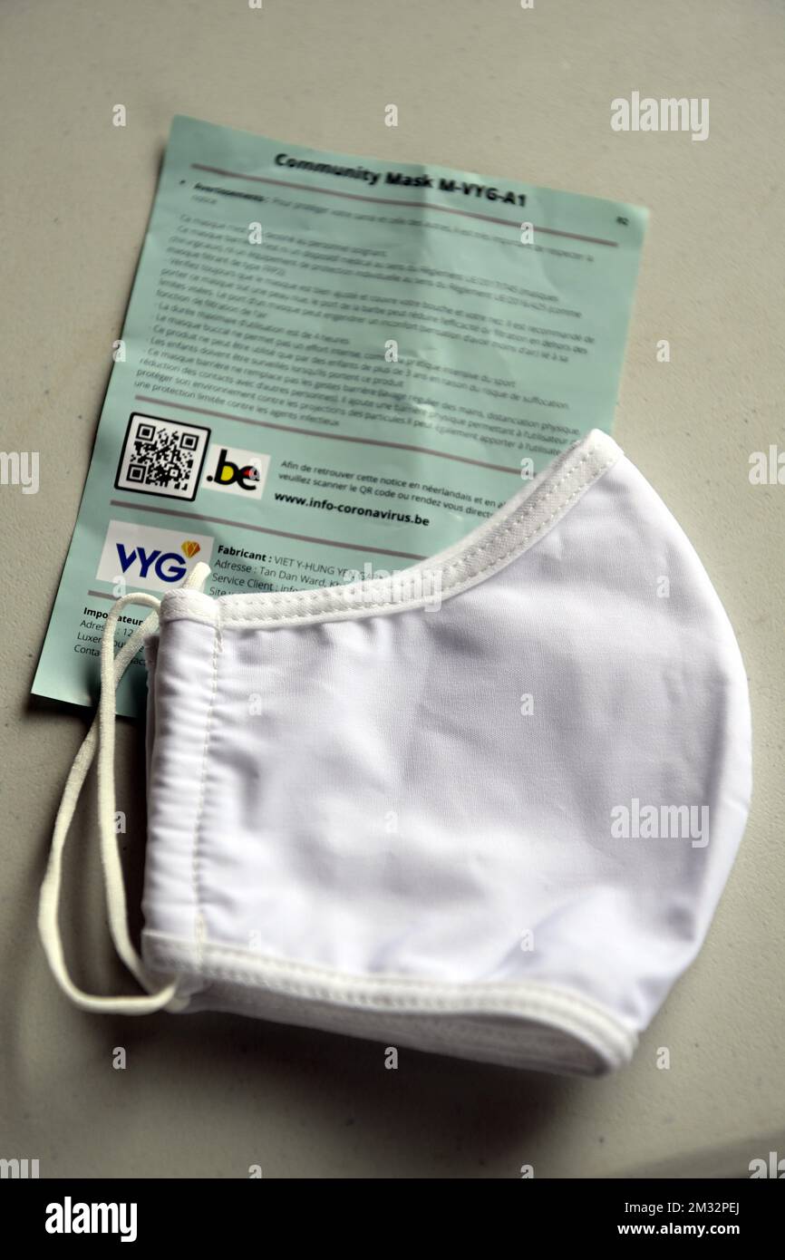 Illustration shows a mask in marge of a press conference of Belgian