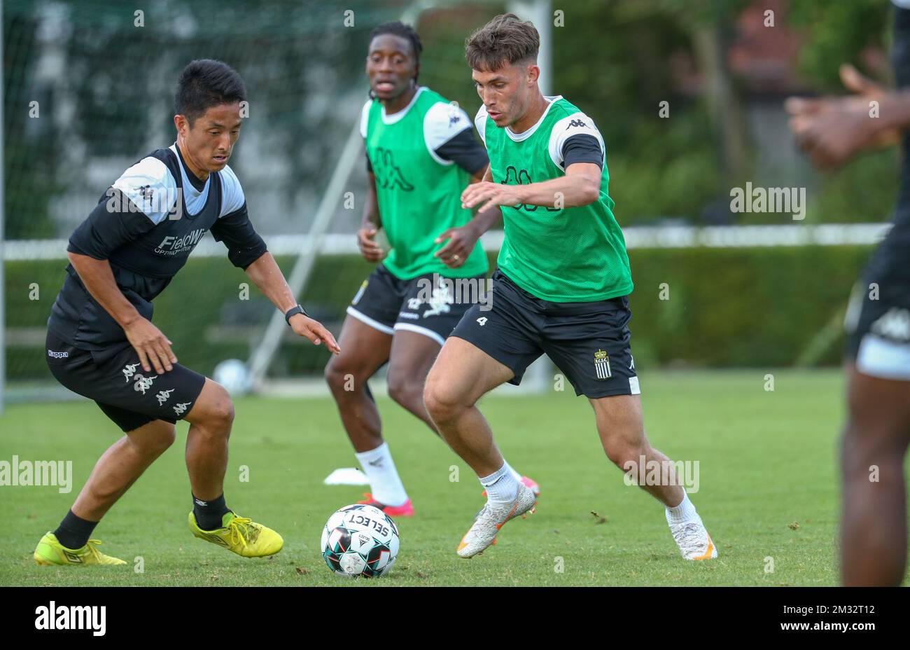 Charleroi's Ryota Morioka and Charleroi's Maxime Busi pictured in action during the second day of the summer training camp of Belgian first division soccer team Sporting Charleroi, in Kamen, Germany, Monday 29 June 2020. BELGA PHOTO VIRGINIE LEFOUR Stock Photo