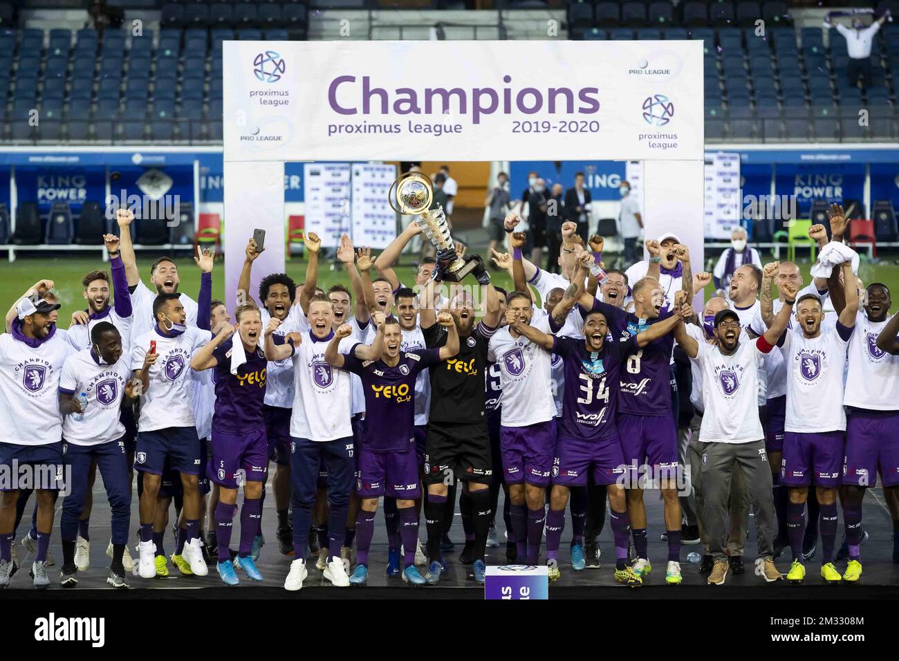 Beerschot's players and staff celebrate after winning the return game