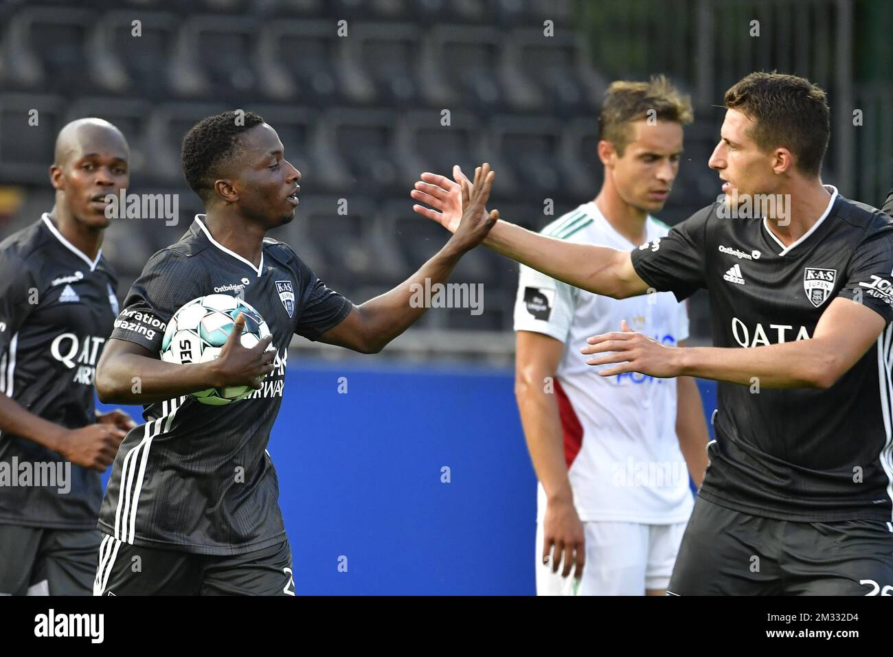 Eupen's Souleymane Aw celebrates after scoring during the Jupiler Pro