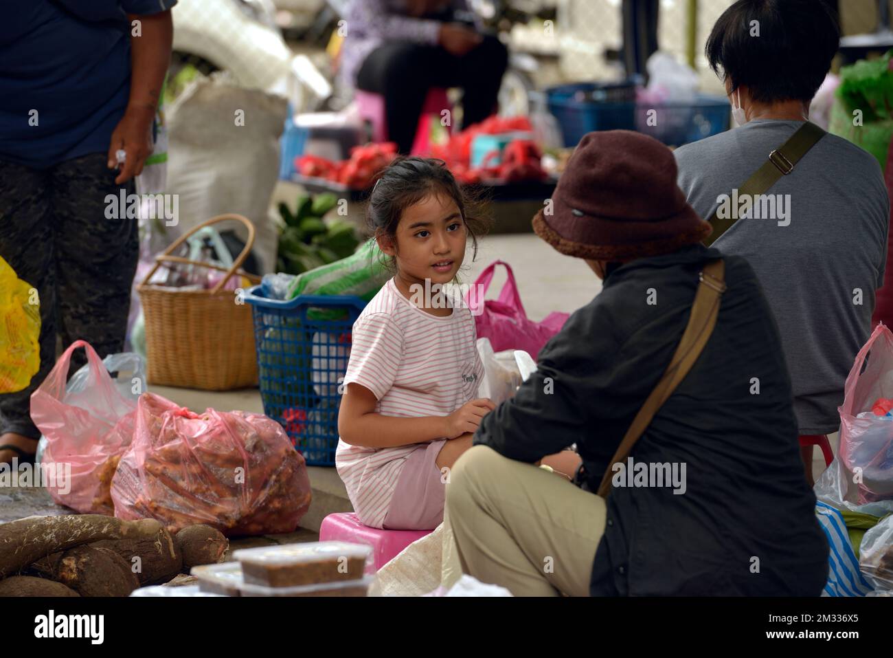 A young, indigenous Bajau girl at the Sunday market (tamu) in Kota Belud, Sabah, Borneo, Malaysia. Stock Photo