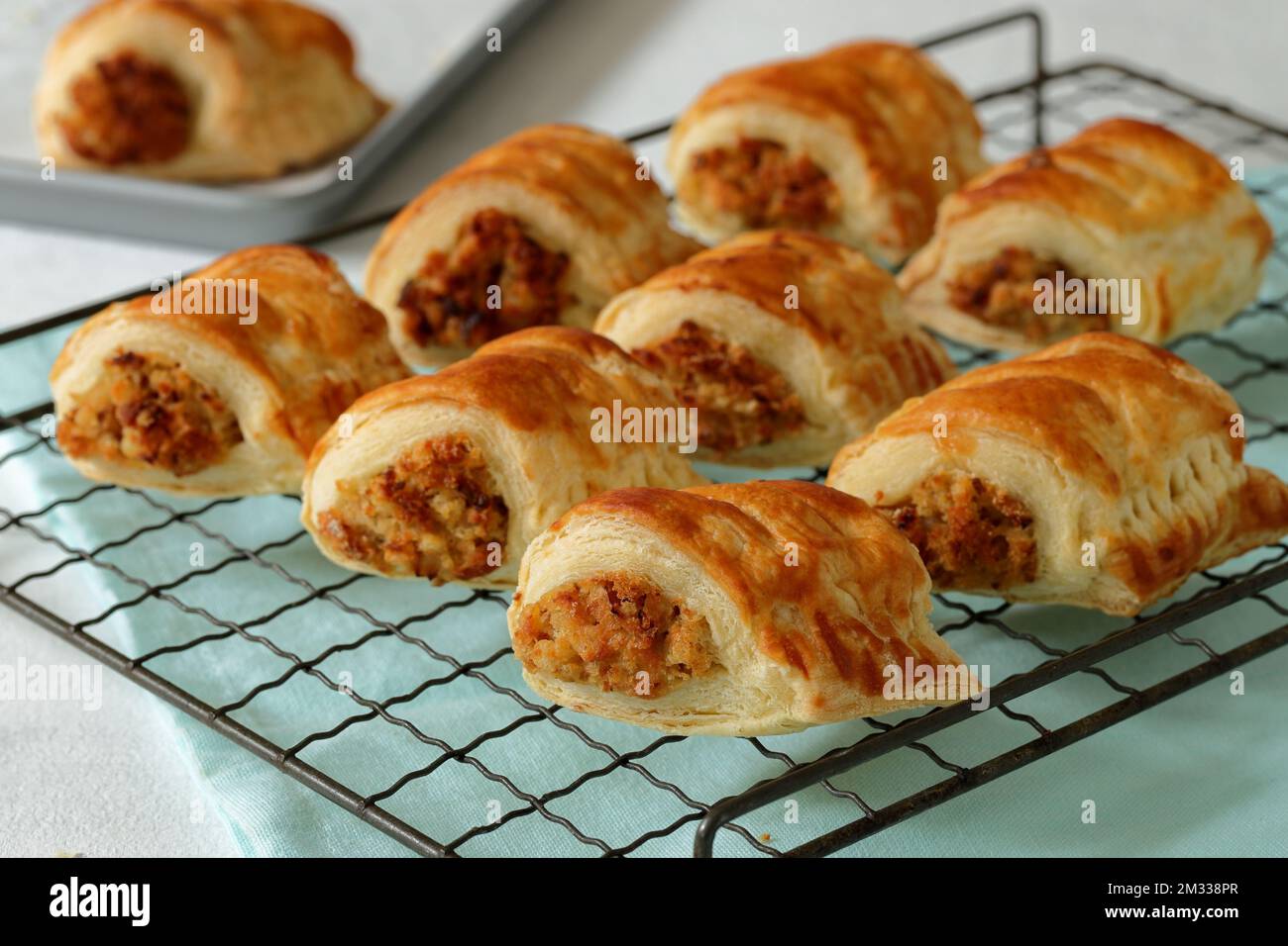 Freshly baked homemade vegetarian sausage rolls made with cheese leeks