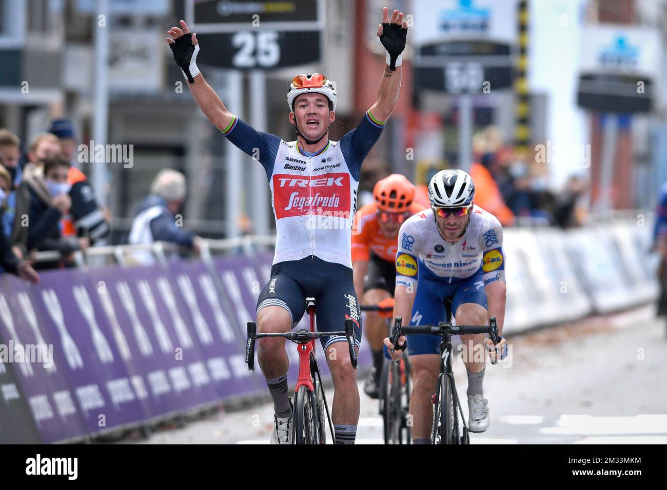 Danish Mads Pedersen of Trek-Segafredo celebrates as he crosses the ...