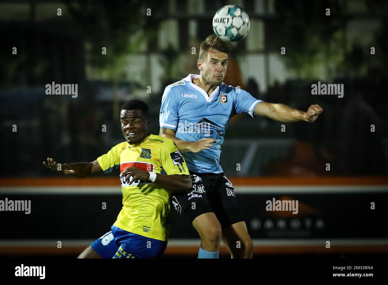 Westerlo's Kouya Mabea and Deinze's Lennart Mertens fights for the ball during a soccer match between KMSK Deinze and Westerlo, Friday 23 October 2020 in Deinze, on day 8 of the 'Proximus League' 1B second division of the Belgian soccer championship. BELGA PHOTO DAVID PINTENS Stock Photo