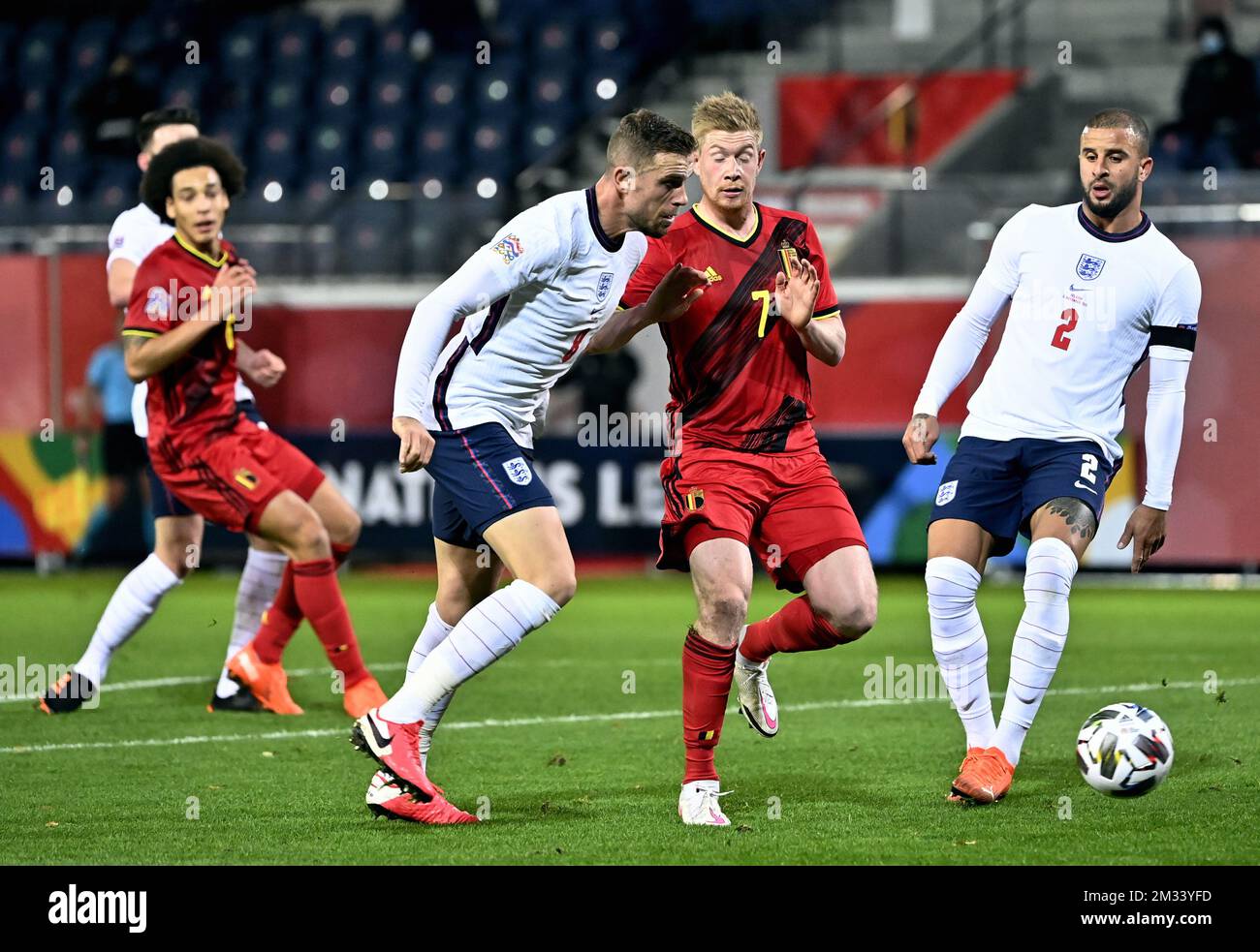 England's midfielder Jordan Henderson, Belgium's Kevin De Bruyne and  England's defender Kyle Walker fight for the ball during a Nations League  soccer game between the Belgian national team Red Devils and England,