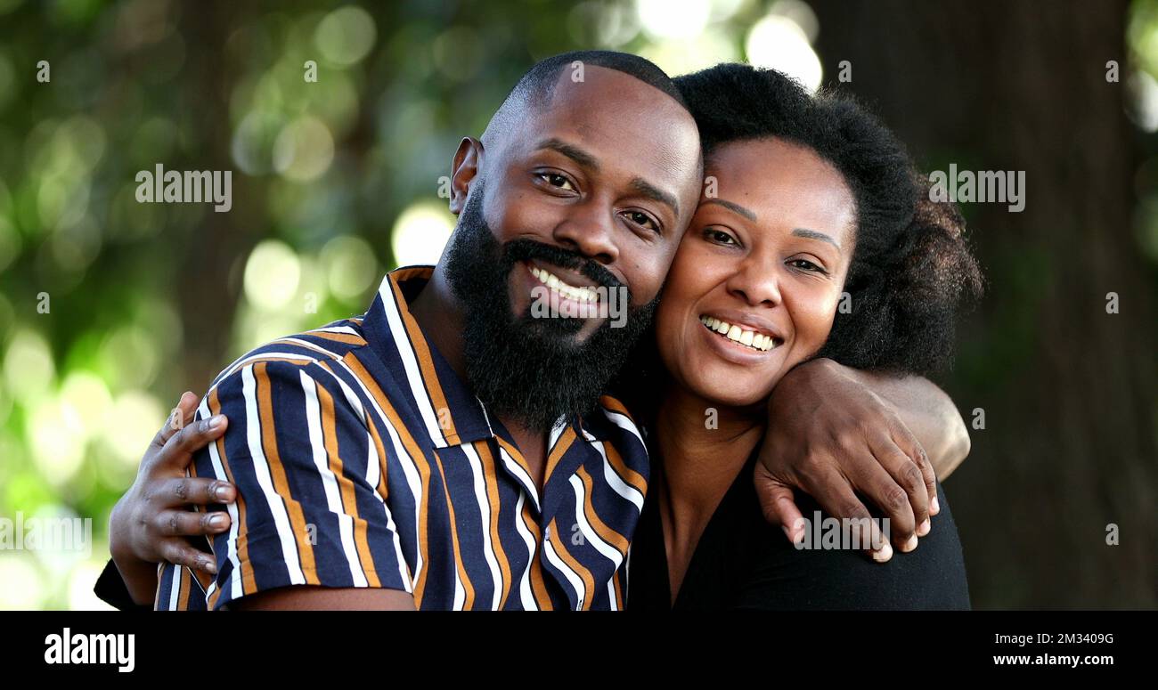 Two beautiful black African couple hugging together-1 Stock Photo - Alamy