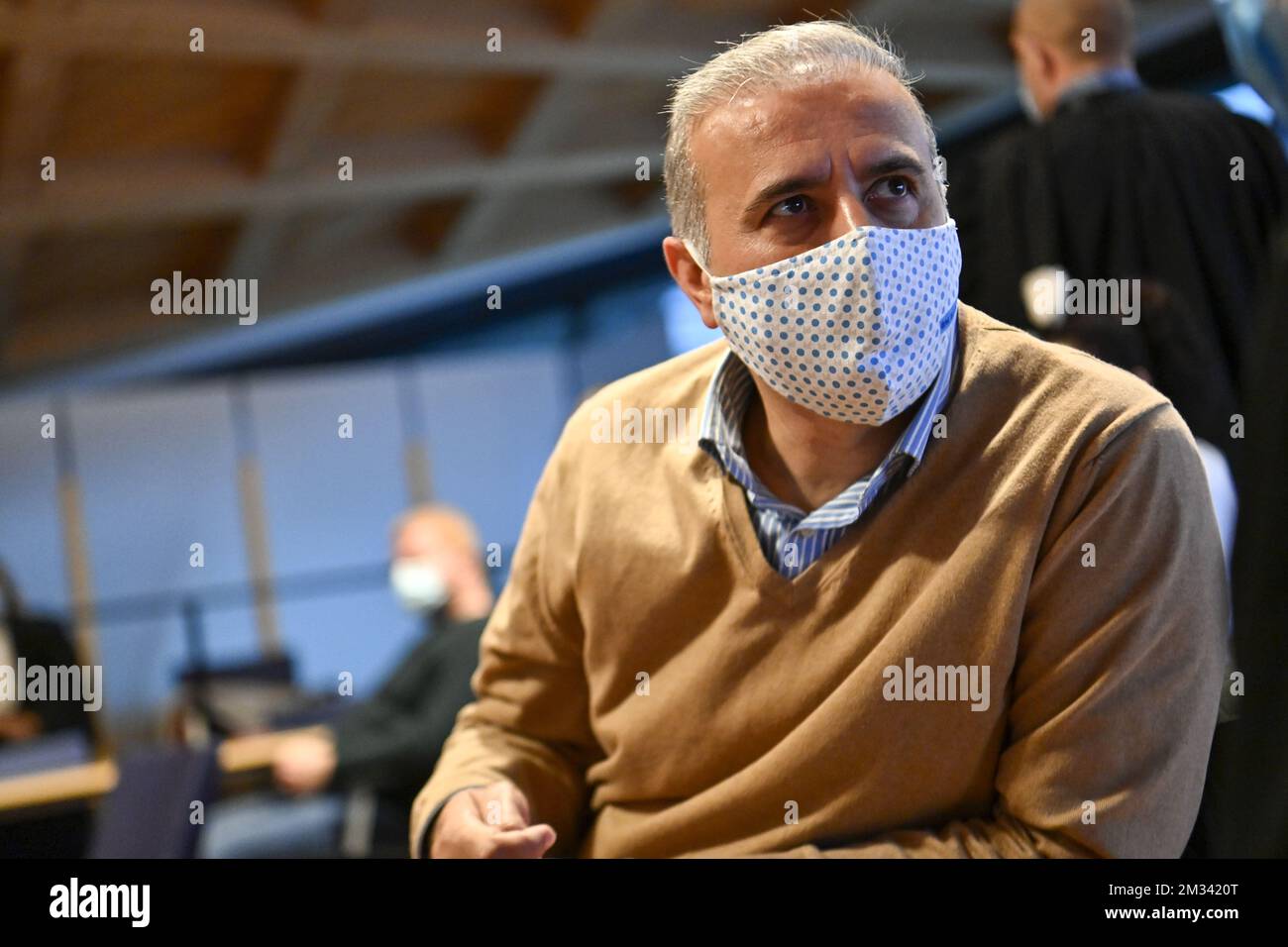 Melikan Kucam pictured during the start of the trial of former Mechelen alderman Kucam (N-VA) and nine other persons, before the Antwerp criminal court, for human trafficking, passive corruption and criminal conspiracy, Monday 30 November 2020. They are accused of helping 219 persons (mainly christians from Syria or Irak) to get humanitarian visa against payments. BELGA PHOTO DIRK WAEM BELGA PHOTO DIRK WAEM Stock Photo