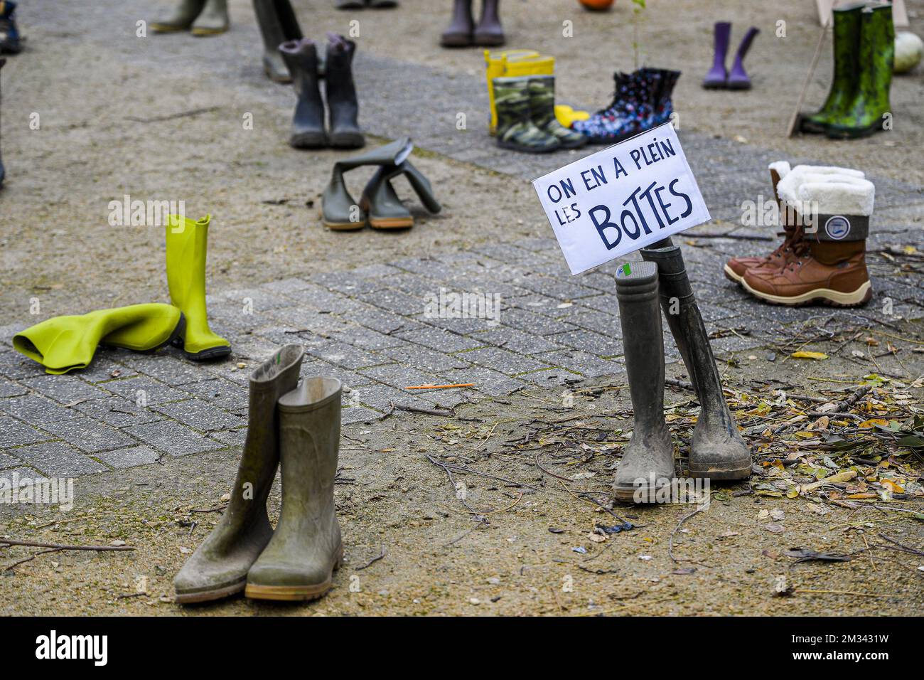 Illustration picture shows a protest action by the Support Network for Peasant Agriculture (ReSAP), Agroecology in Action, Youth for Climate and around fifteen other organizations, in the center of the European area, in Brussels, Sunday 06 December 2020. The protesters denounce the inconsistency between the agricultural, trade and environmental policies of the European Union by install the shoes and boots of farmers who have disappeared against the European institutions. For the farmers' movement, the ratification of the EU-Mercosur free trade treaty and the CAP reform project condemn nourishi Stock Photo