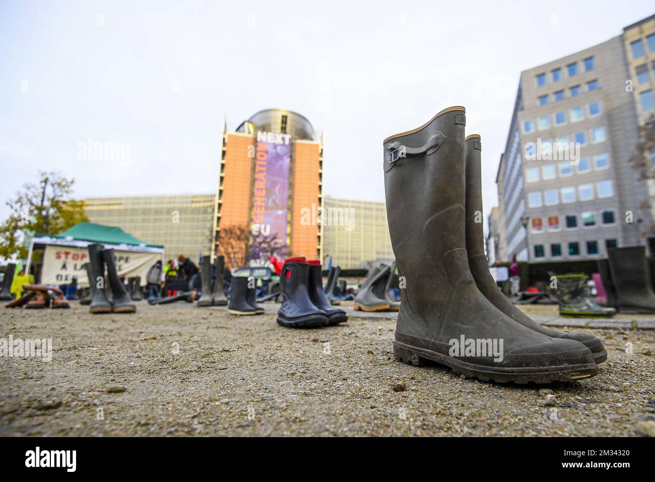 Illustration picture shows a protest action by the Support Network for Peasant Agriculture (ReSAP), Agroecology in Action, Youth for Climate and around fifteen other organizations, in the center of the European area, in Brussels, Sunday 06 December 2020. The protesters denounce the inconsistency between the agricultural, trade and environmental policies of the European Union by install the shoes and boots of farmers who have disappeared against the European institutions. For the farmers' movement, the ratification of the EU-Mercosur free trade treaty and the CAP reform project condemn nourishi Stock Photo