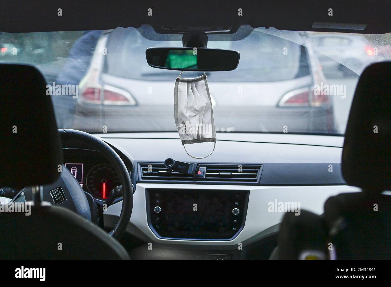https://c8.alamy.com/comp/2M34841/illustration-picture-shows-a-mouth-mask-hanging-from-the-interior-rearview-mirror-of-a-car-in-brussels-tuesday-12-january-2021-the-vias-institute-for-road-safety-warns-that-the-masks-may-be-unsafe-as-it-obstructs-the-view-and-can-be-a-source-of-distraction-for-the-driver-in-principle-police-officers-can-even-impose-fines-if-the-drivers-view-is-obstructed-by-an-unnecessary-object-belga-photo-laurie-dieffembacq-2M34841.jpg