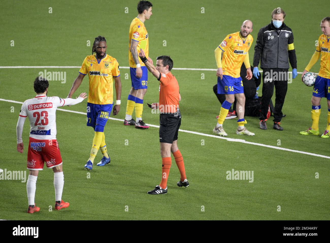 Mouscron's Bruno Xadas Alexandre Vieira Almeida receives a yellow card from referee Erik Lambrechts during a soccer match between STVV Sint-Truiden and Royal Excel Mouscron, Saturday 23 January 2021 in Sint-Truiden, on day 21 of the 'Jupiler Pro League' first division of the Belgian championship. BELGA PHOTO YORICK JANSENS Stock Photo