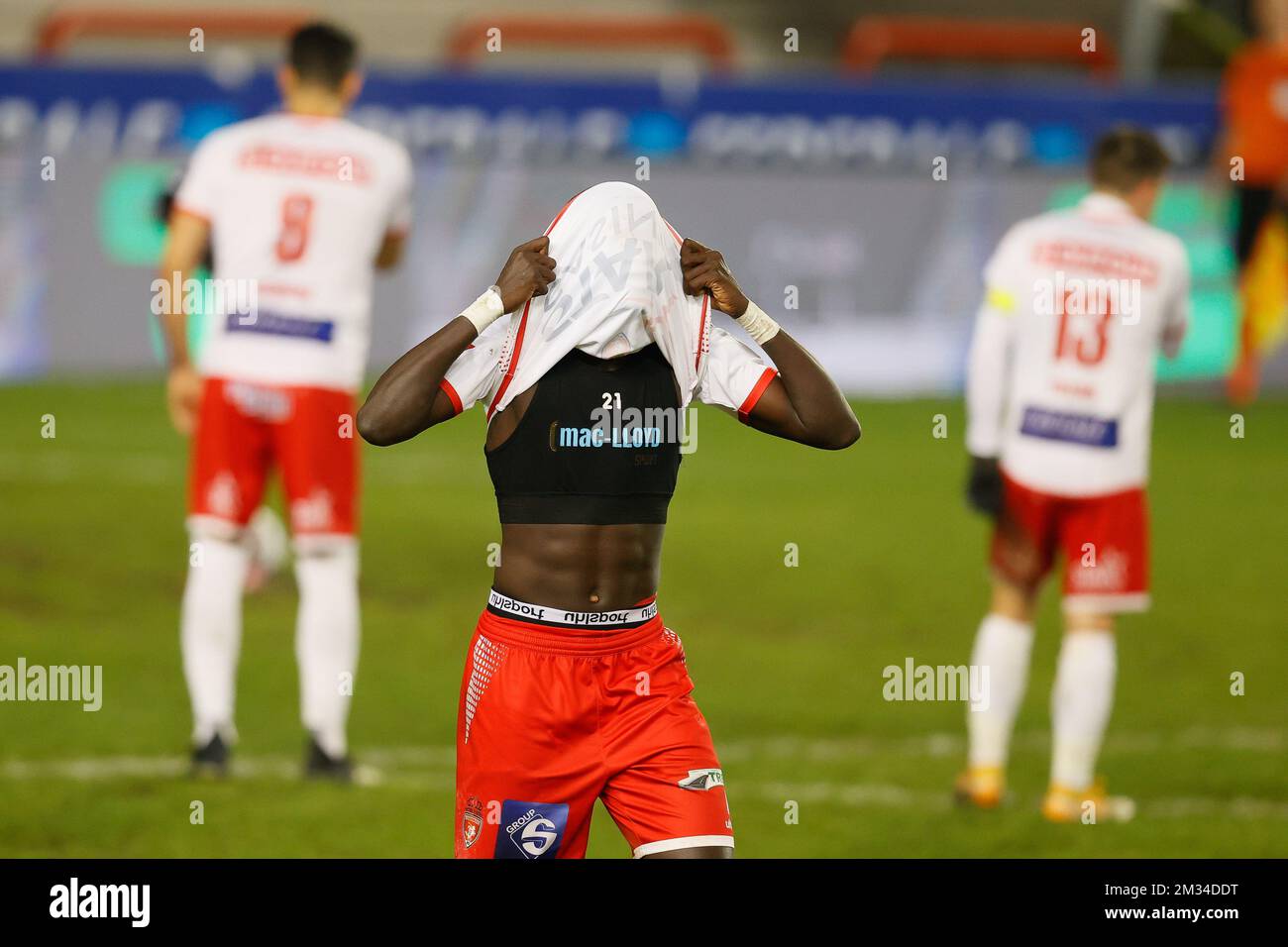 Mouscron's El Hadji Gueye leaves the field after receiving a red card during a soccer match between Royal Excel Mouscron and KV Kortrijk, Friday 05 February 2021 in Mouscron, on day 24 of the 'Jupiler Pro League' first division of the Belgian championship. BELGA PHOTO BRUNO FAHY Stock Photo
