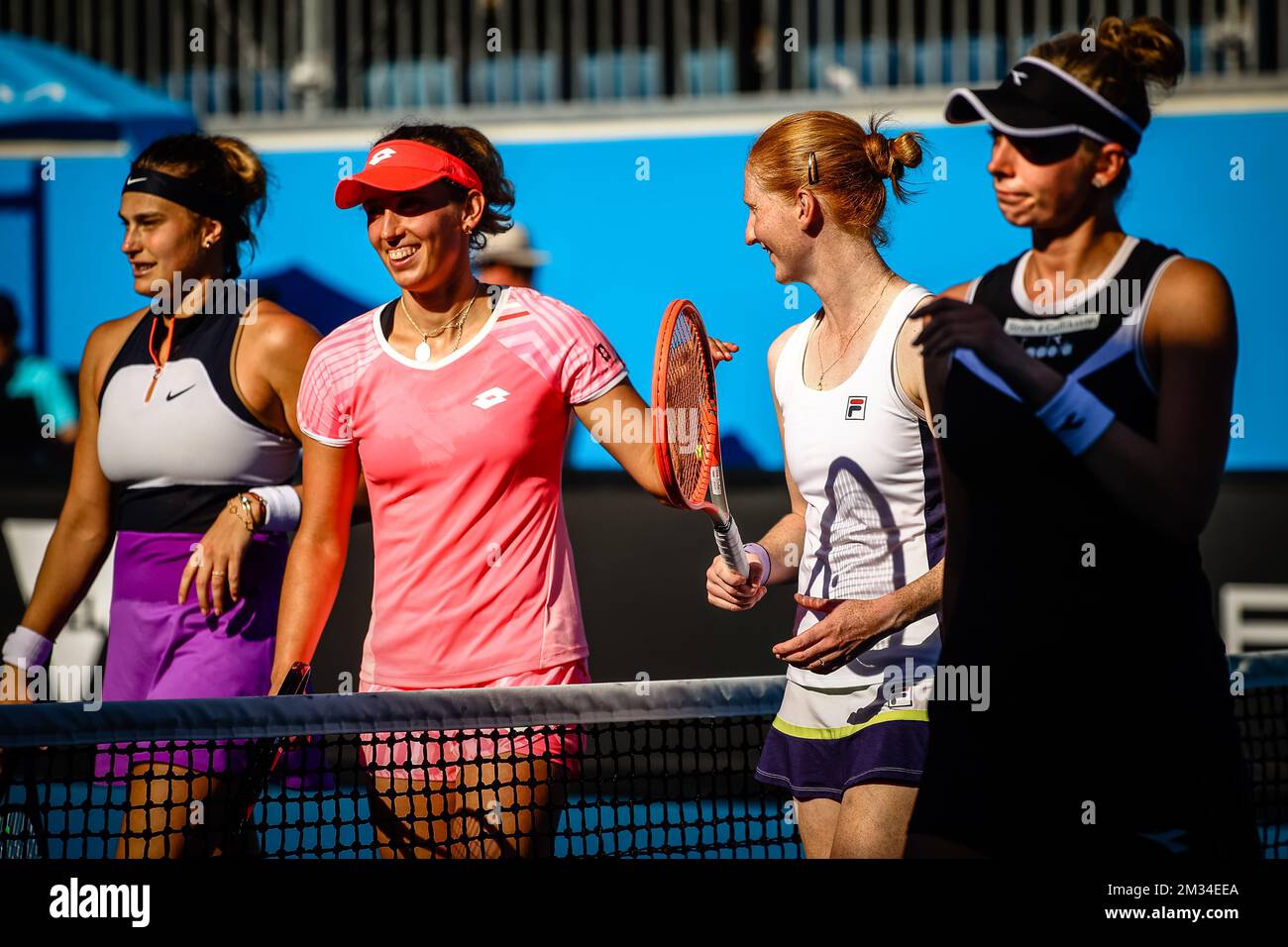 L-R, Belgian Elise Mertens, Belarussian Aryna Sabalenka won over Belgian Alison Van Uytvanck and Swedish Cornelia Lister at a tennis match between the Belgian-Swedish pair Van Uytvank and Lister and the Belgian-Belarus pair Mertens and Sabalenka, in the first round of the women's doubles competition of the 'Australian Open' tennis Grand Slam, Wednesday 10 February 2021 in Melbourne Park, Melbourne, Australia. The 2021 edition of the Australian Grand Slam has been delayed by three week because of the ongoing pandemic. BELGA PHOTO PATRICK HAMILTON Stock Photo