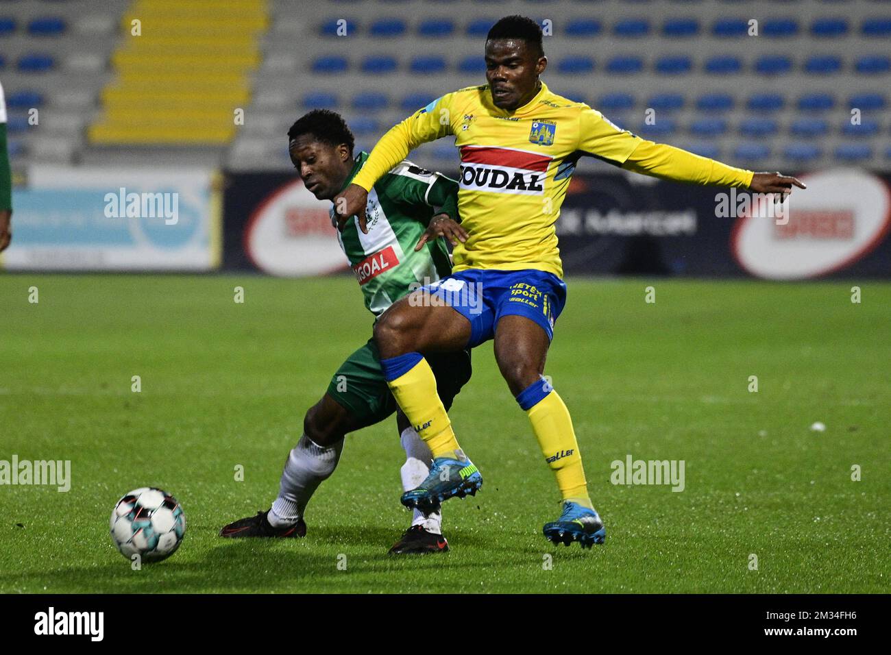 Lommel's Marlos Moreno and Westerlo's Kouya Mabea fight for the ball during a soccer match between KVC Westerlo and Lommel SK, Monday 15 February 2021 in Westerlo, on day 19 of the 'Proximus League' 1B second division of the Belgian soccer championship. BELGA PHOTO YORICK JANSENS Stock Photo