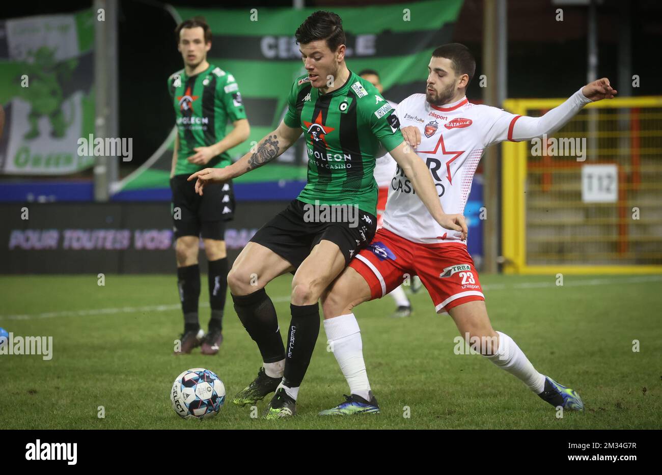 Cercle's Giulian Biancone and Mouscron's Bruno Xadas Alexandre Vieira Almeida fight for the ball during a soccer match between Royal Excel Mouscron and Cercle Brugge, Saturday 20 February 2021 in Mouscron, on day 27 of the 'Jupiler Pro League' first division of the Belgian championship. BELGA PHOTO VIRGINIE LEFOUR Stock Photo