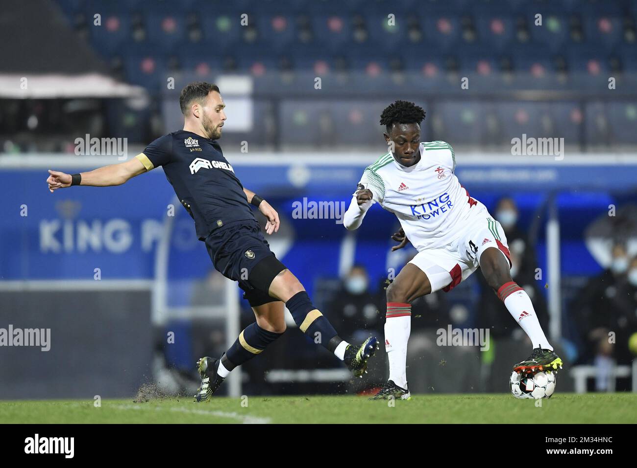 Antwerp's Birger Verstraete and OHL's Kamal Sowah fight for the ball during a soccer match between OH Leuven and Royal Antwerp FC, Monday 01 March 2021 in Oud-Heverlee, on day 28 of the 'Jupiler Pro League' first division of the Belgian championship. BELGA PHOTO JOHN THYS Stock Photo