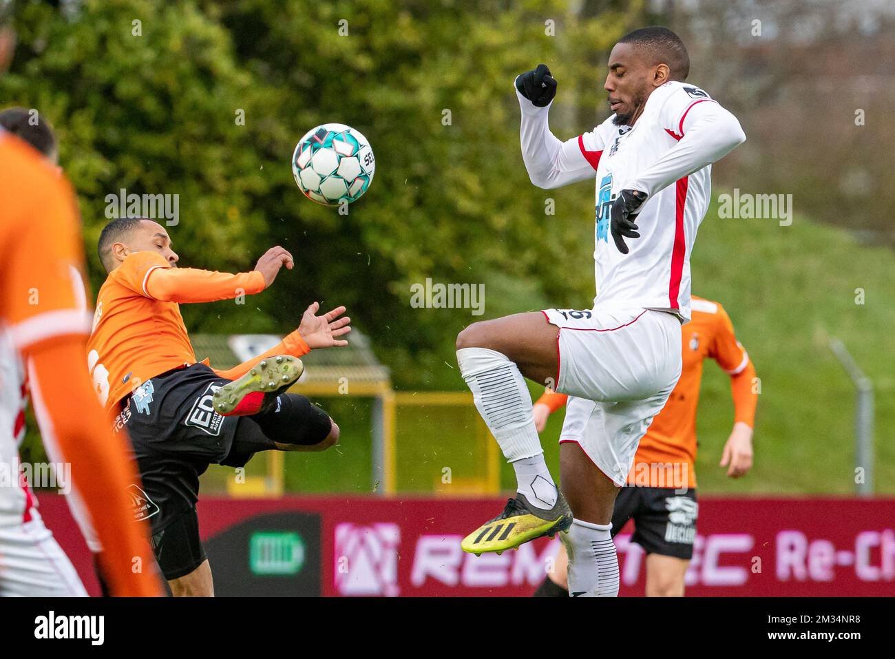 Deinze's Flavien Le Postollec and Rwdm's Thomas Ephestion fight for the ball during a soccer match between KMSK Deinze and RWDM, Thursday 18 March 2021 in Deinze, a postponed match of day 18 of the 'Proximus League' 1B second division of the Belgian championship. BELGA PHOTO KURT DESPLENTER Stock Photo