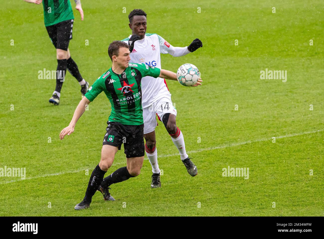OHL's Kamal Sowah and Cercle's Robbe Decostere fight for the ball during a soccer match between Cercle Brugge and Oud-Heverlee Leuven, Saturday 10 April 2021 in Brugge, on day 33 of the 'Jupiler Pro League' first division of the Belgian championship. BELGA PHOTO KURT DESPLENTER Stock Photo