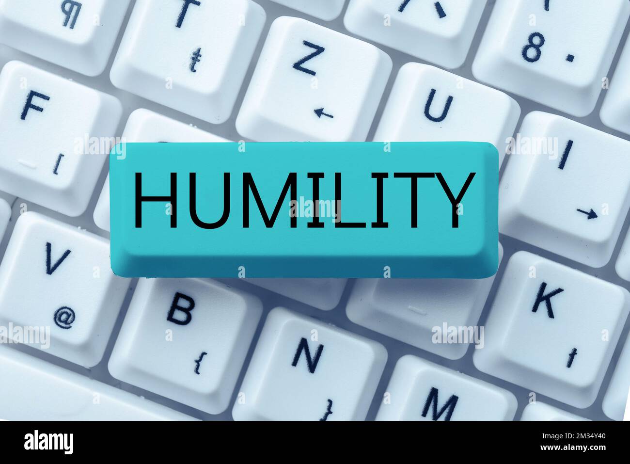 Hand writing sign Humility. Concept meaning being Humble is a Virtue