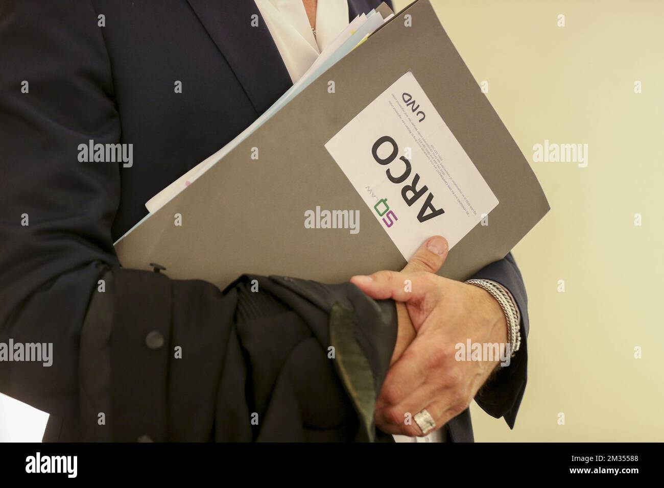 Illustration picture shows a lawyer holding an ARCO file pictured ahead