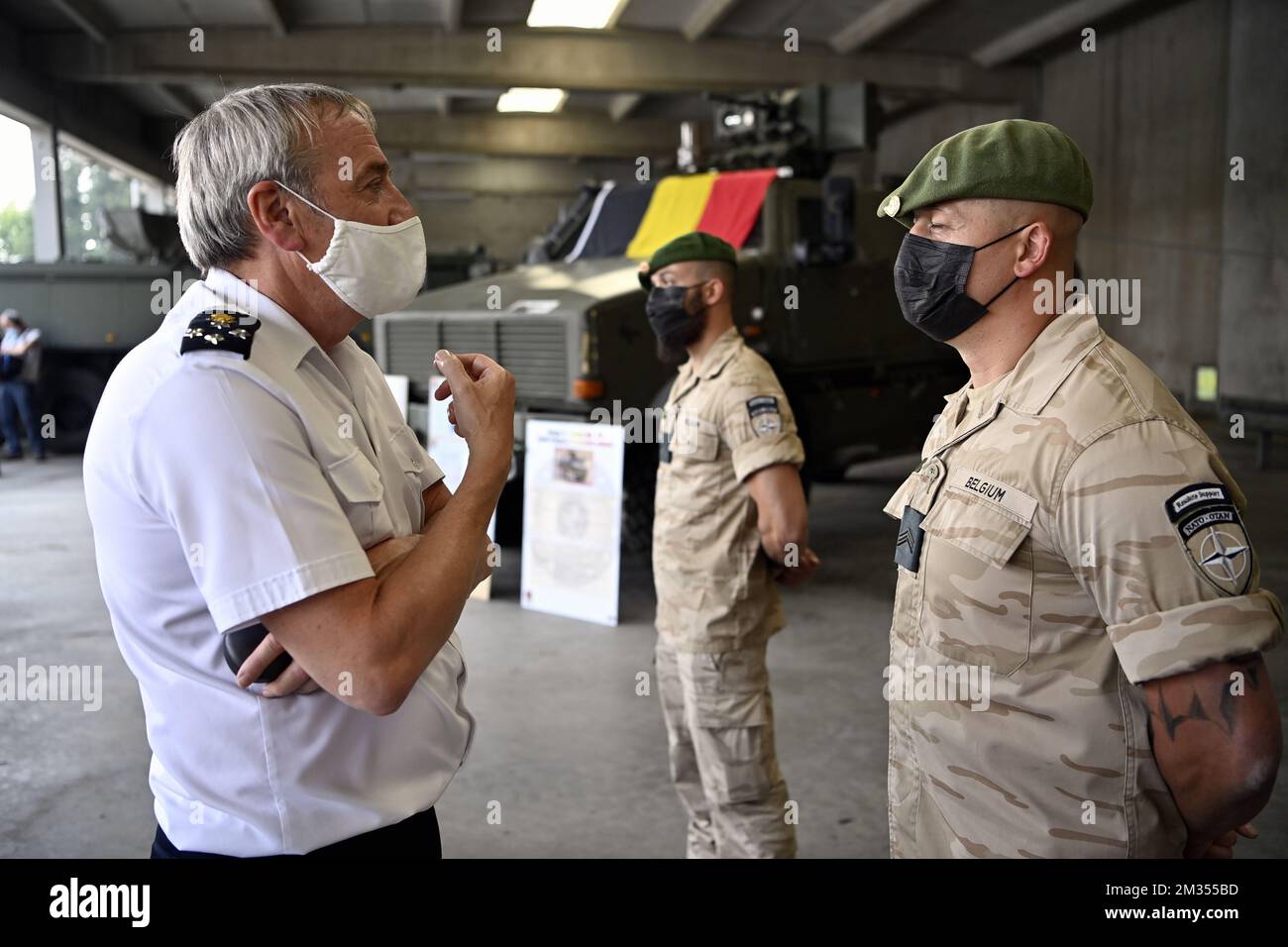 Chief of Defence Michel Hofman (L) pictured during a demonstration of the 'Chasseurs Ardennais', after a press conference of the Defence, concerning the Resolute Support (RSM) mission in Afghanistan, in Marche-en-Famenne, Wednesday 09 June 2021. Defence participated in the international coalition in Afghanistan for almost two decades. The last detachment will return from Mazar-I-Sharif in mid-2021. BELGA PHOTO ERIC LALMAND Stock Photo