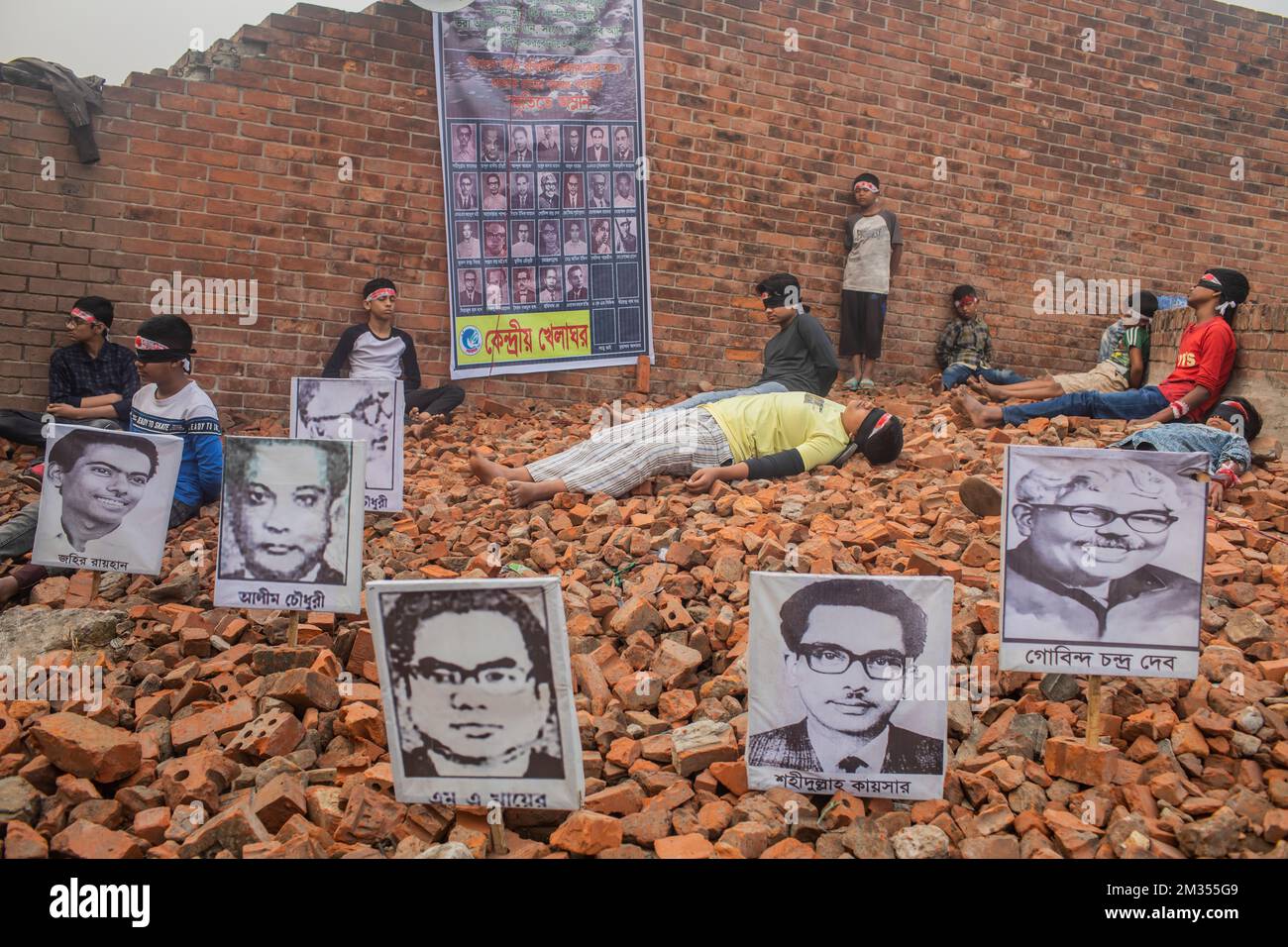 Portraits of intellectuals who were killed on 14th December are seen in ...