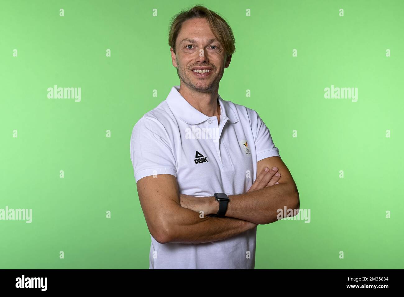 Musician Regi Penxten poses for the photographer at a photoshoot for