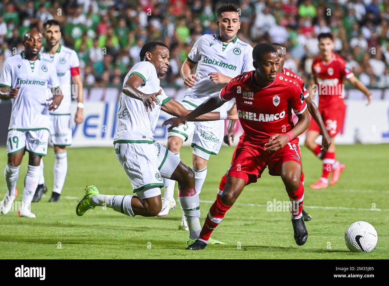 Omonoia's Shehu Abdullahi and Antwerp's Michel Ange Balikwisha fight for the ball during the match between Belgian soccer team Royal Antwerp FC and Omonia Nicosia, the first leg of the play-off for the Europea League competition, in Nicosia, Cyprus, Thursday 19 August 2021. BELGA PHOTO LAURIE DIEFFEMBACQ Stock Photo