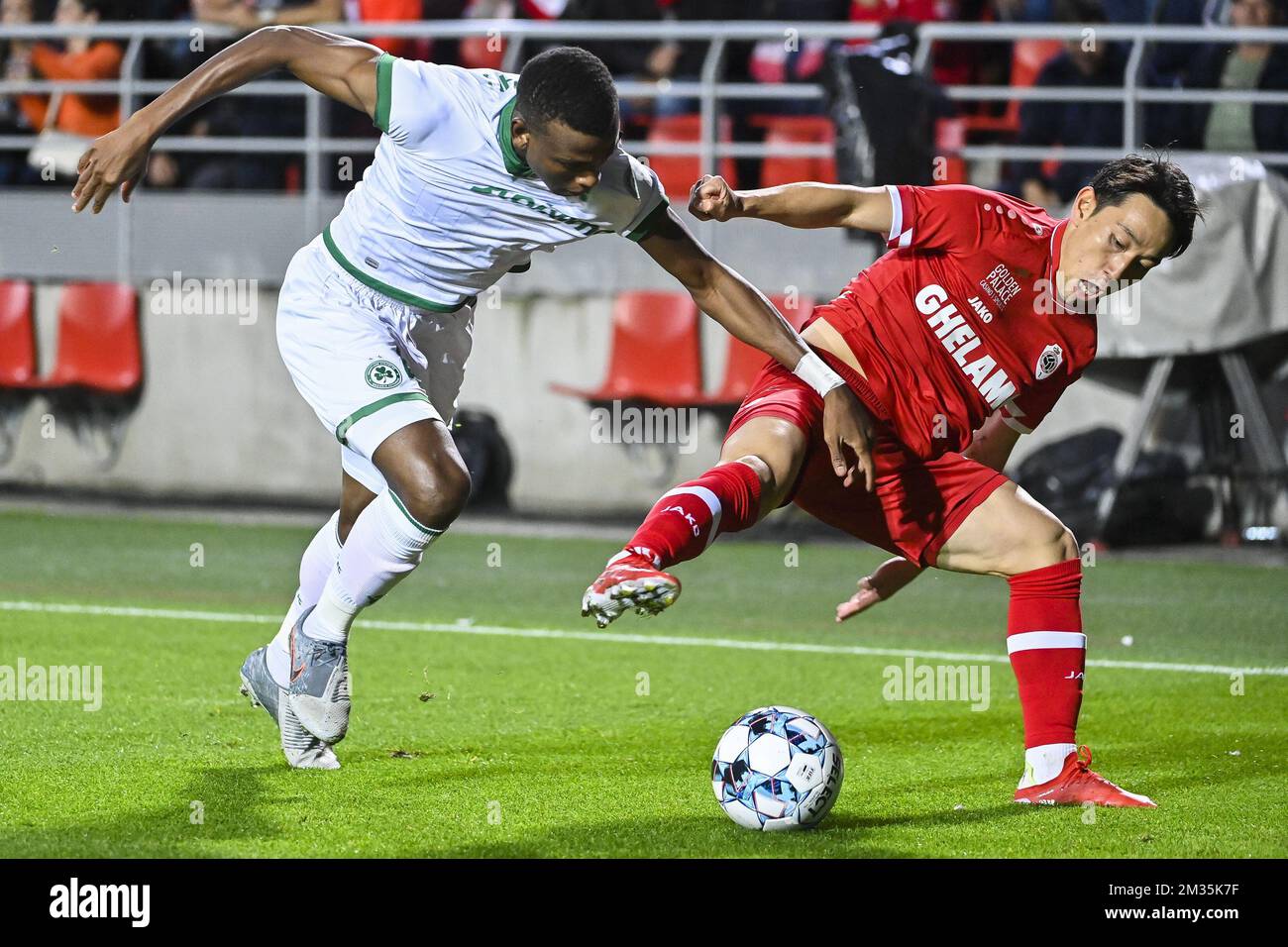 Omonoia's Shehu Abdullahi and Antwerp's Koji Miyoshi fight for the ball during a soccer game between Belgian team Royal Antwerp FC and Cyprus club Omonia Nicosia, Thursday 26 August 2021 in Antwerp, the return leg of the play-off for the Europa League competition. BELGA PHOTO LAURIE DIEFFEMBACQ Stock Photo
