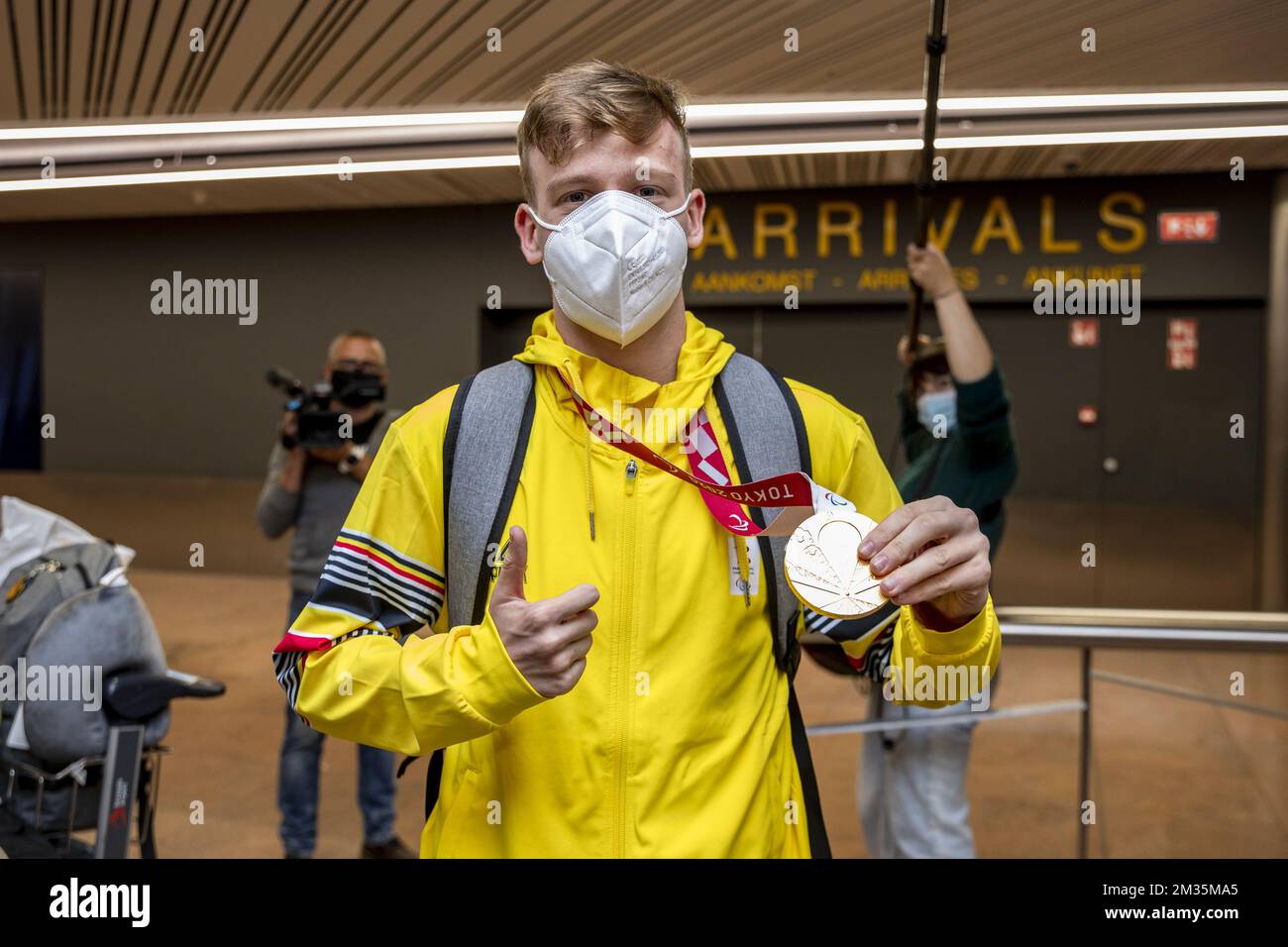 Belgian table tennis player Laurens Devos and his medal pictured at the ...