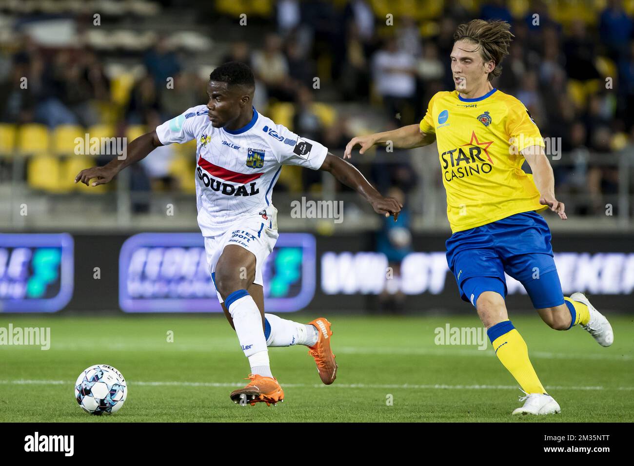 Westerlo's Kouya Mabea and Waasland-Beveren's Joan Simun Edmundsson pictured in action during a soccer match between Waasland-Beveren and KVC Westerlo, Sunday 12 September 2021 in , on day 4 of the '1B Pro League' second division of the Belgian soccer championship. BELGA PHOTO KRISTOF VAN ACCOM Stock Photo