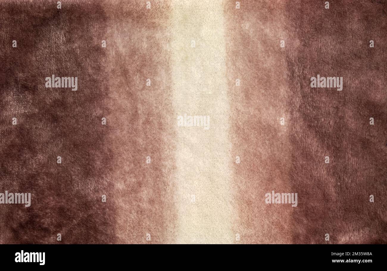 Close-up pattern of fleece fabric. Shades of beige on the surface of ...