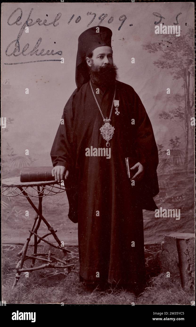 A Greek priest of the Orth. Church. They all wear these caps , Priests