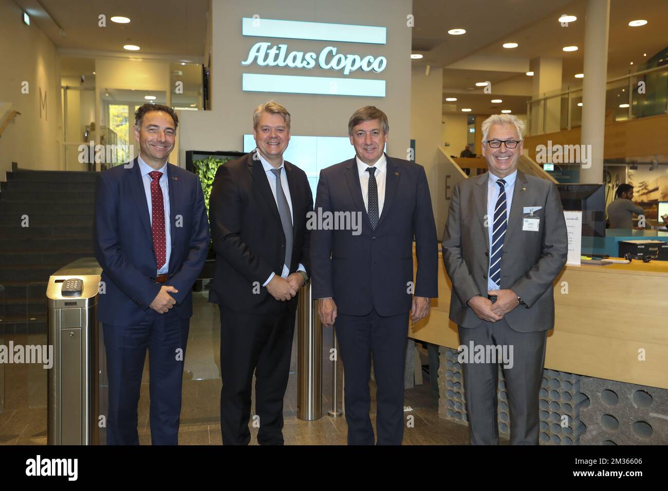 Peter Kinnart, Atlas Copco CEO Mats Rahmstrom, Flemish Minister President Jan Jambon and Alex Bongaerts pictured during a visit to the Atlas Copco Headquarters on the second day of an official visit to Sweden, in Stockholm, Tuesday 19 October 2021. BELGA PHOTO NICOLAS MAETERLINCK Stock Photo