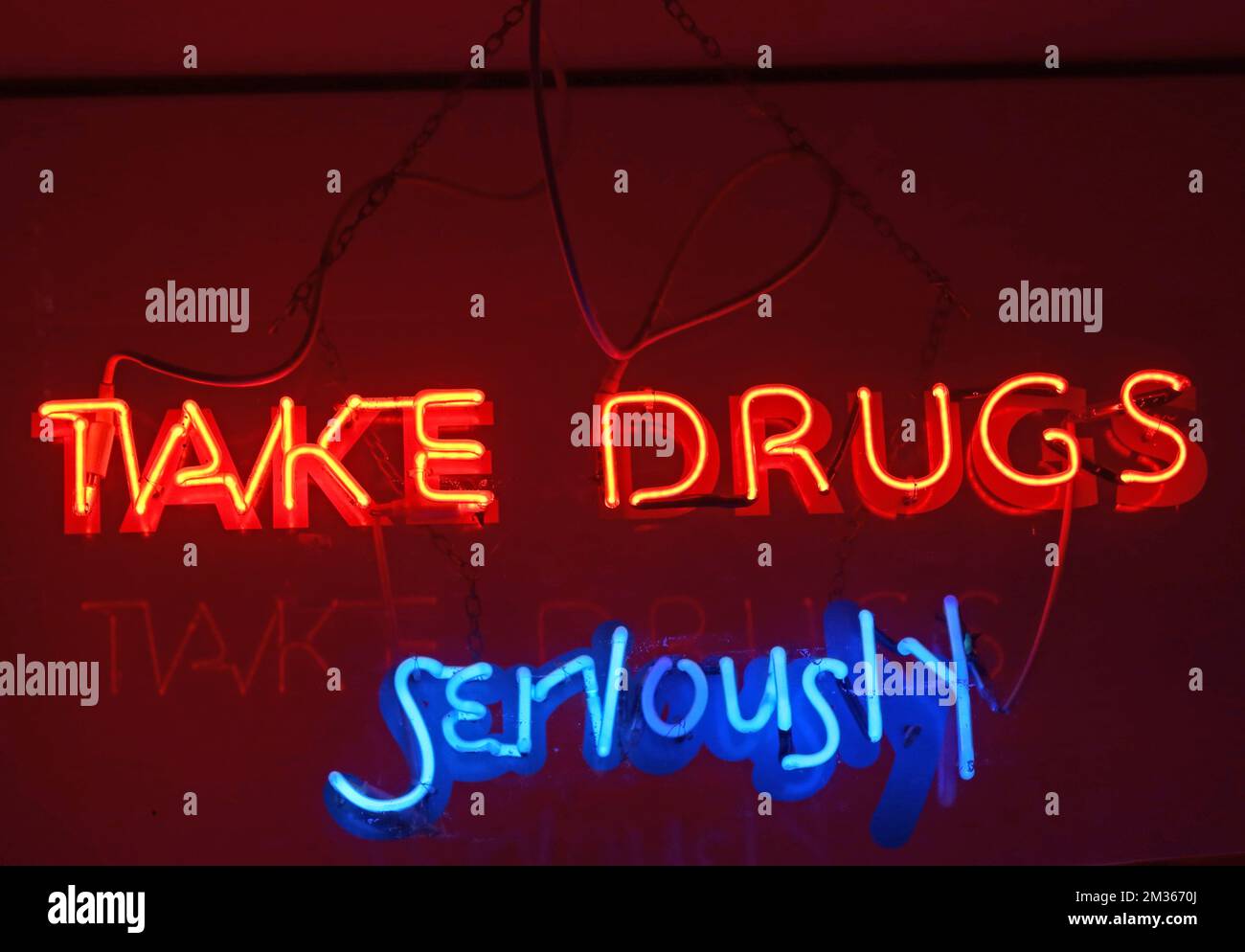 Take Drugs Seriously, neon sign, Crew 2000, mind altering, harm reduction and outreach charity, 32 Cockburn Street, Edinburgh,Scotland, EH1 1PB Stock Photo