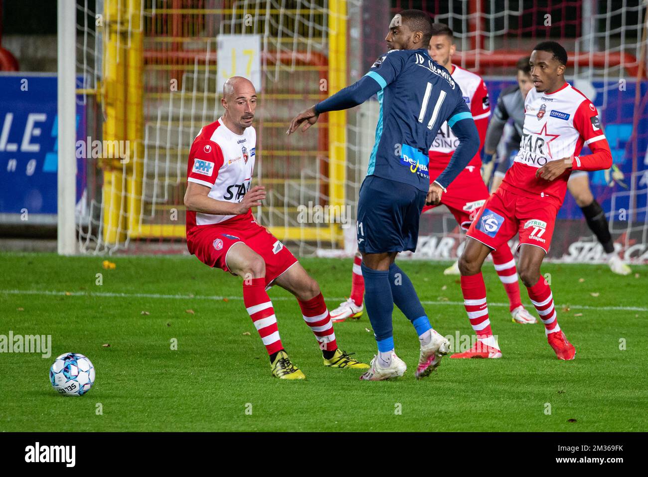 Mouscron's Christophe Lepoint and Rwdm's Thomas Ephestion fight for the ball during a soccer match between Royal Excel Mouscron and RWDM Molenbeek, Friday 22 October 2021 in Mouscron, on day 9 of the '1B Pro League' second division of the Belgian soccer championship. BELGA PHOTO KURT DESPLENTER Stock Photo