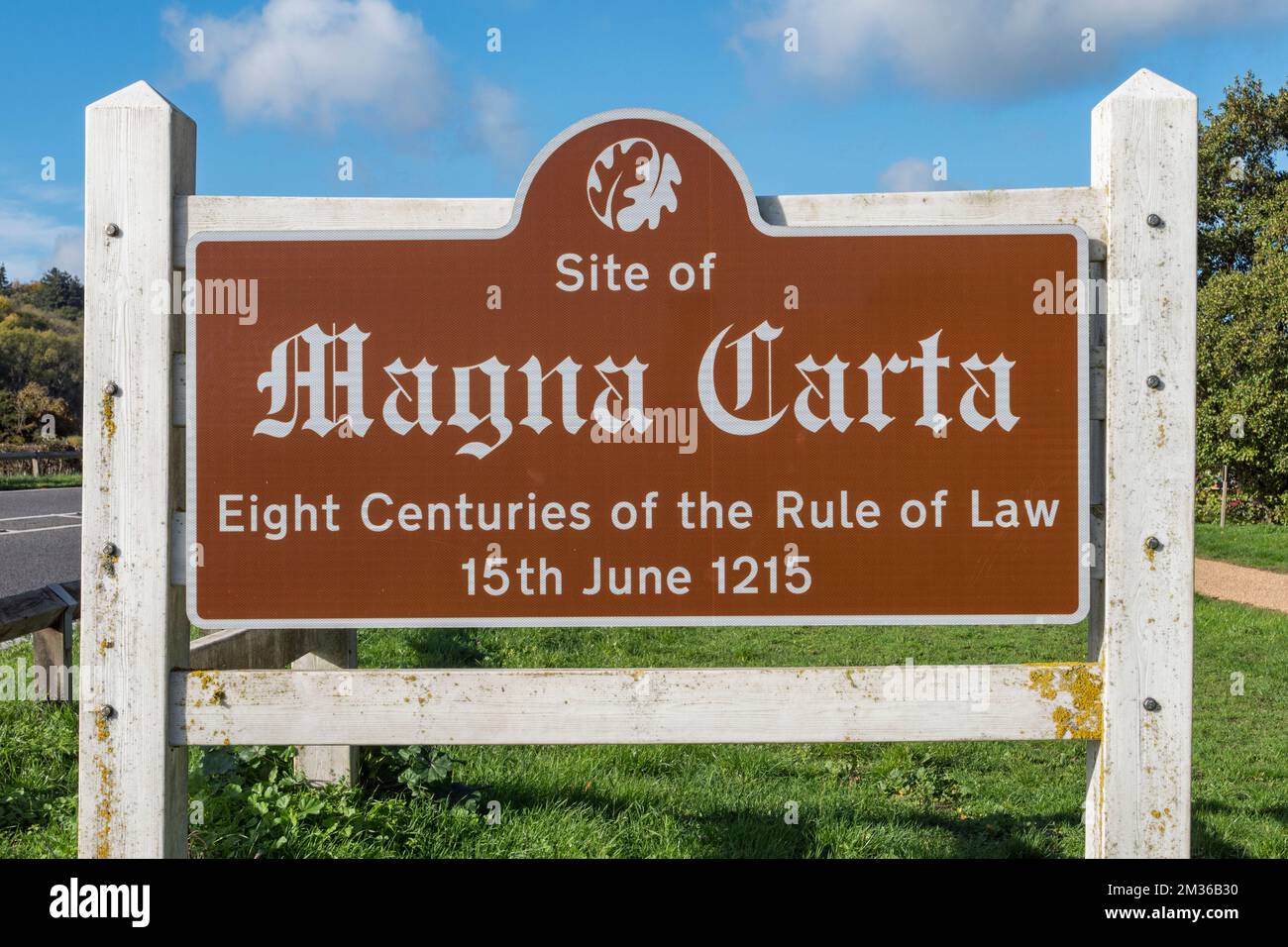 Historic marker sign besdie the meadows at Runnymede, site of the signing of the Magna Carta, 1215. Stock Photo