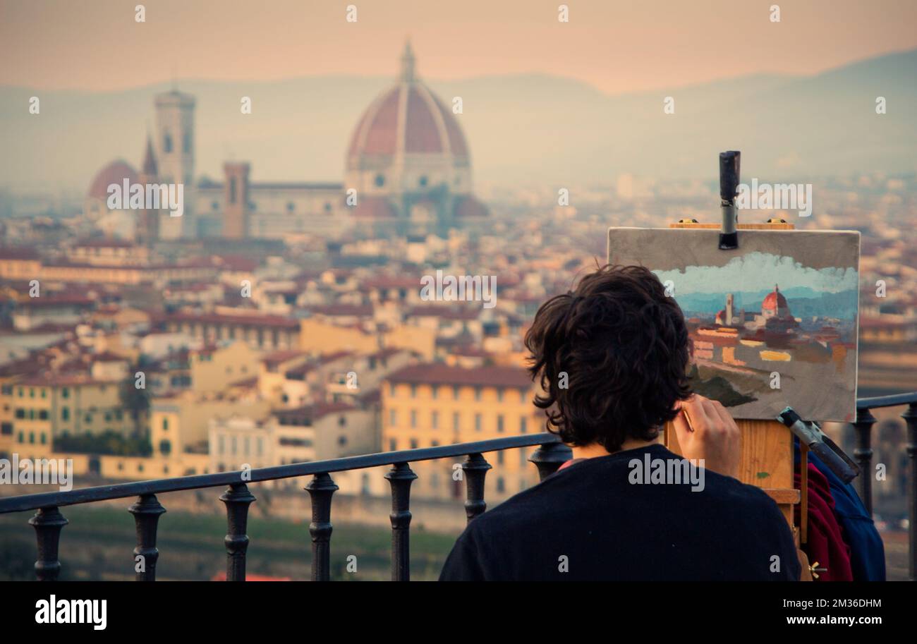 Florence, Italy November 10 2011, Painter Painting skyline of florence and duomo from Piazzale Michelangelo Stock Photo