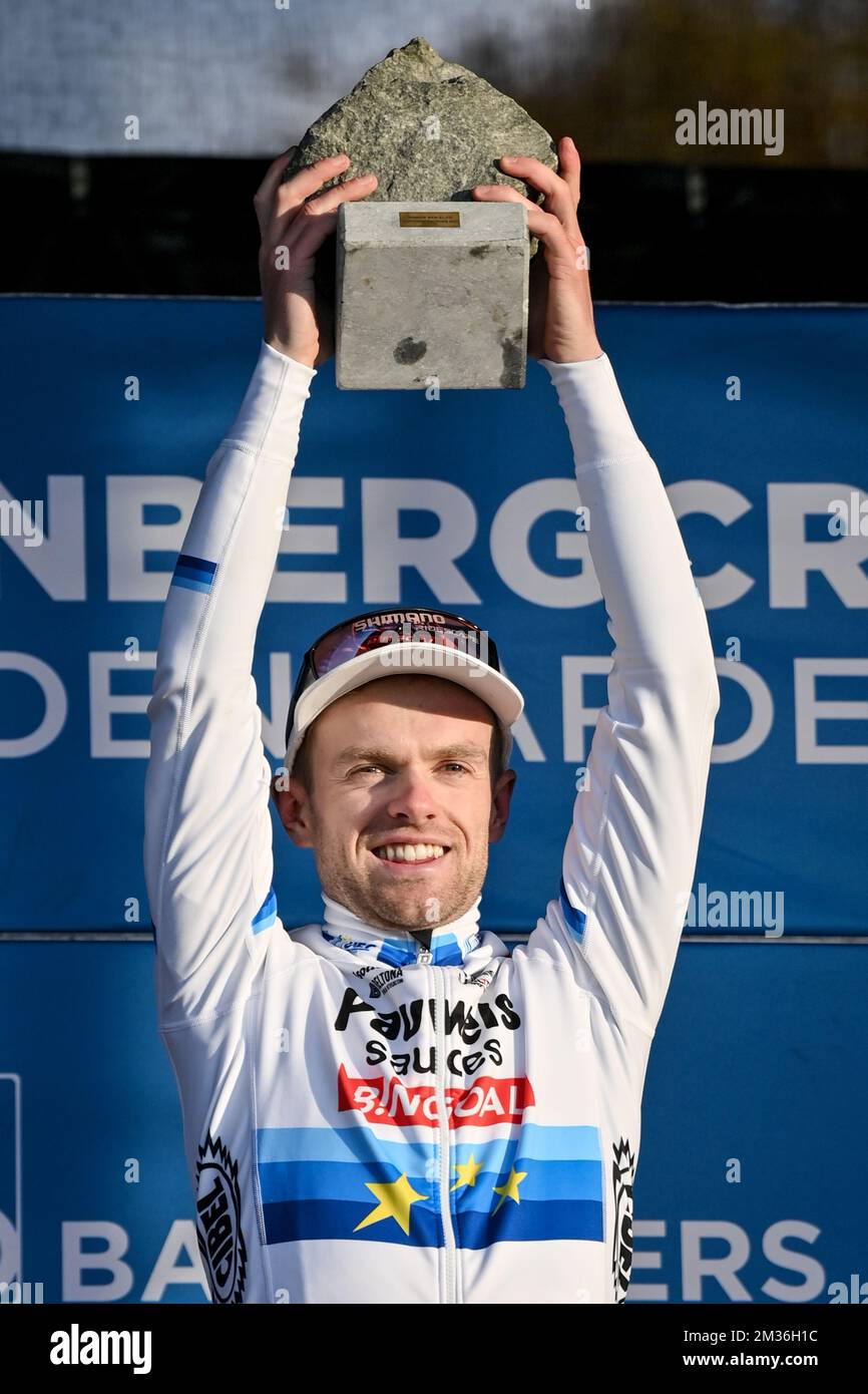 Belgian Eli Iserbyt on the podium with the cobblestone after winning the  Koppenbergcross men elite race, first race of the X2O Badkamers 'Trofee  Veldrijden' trophy (out of eight), in Oudenaarde, Monday 01