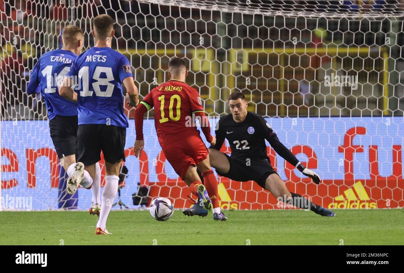 Belgium's Eden Hazard and Estonia's goalkeeper Igonen Matvei pictured in action at a soccer match between Belgian national team the Red Devils and Estonia's national team, in Brussels, Saturday 13 November 2021, game 7 in group E of the qualifications for the 2022 FIFA World Cup. BELGA PHOTO VIRGINIE LEFOUR Stock Photo